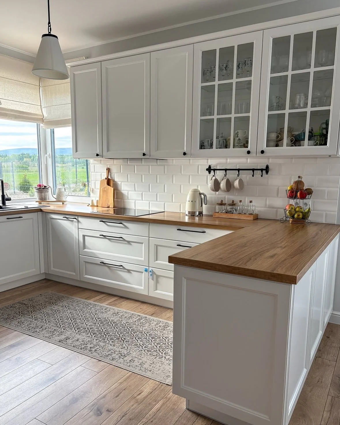 10. Warm White with Scandinavian Simplicity (Kitchen Rug Ideas)