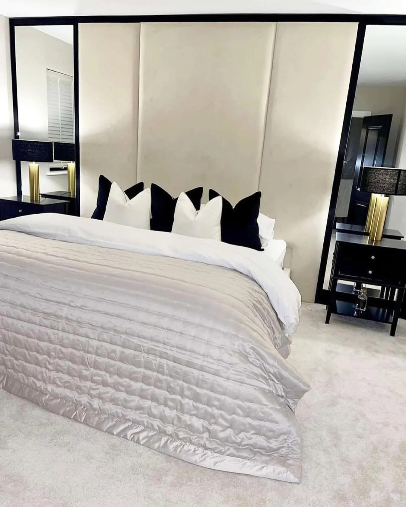 10. Framed Neutral Opulence (Black and Cream Bedroom Ideas)