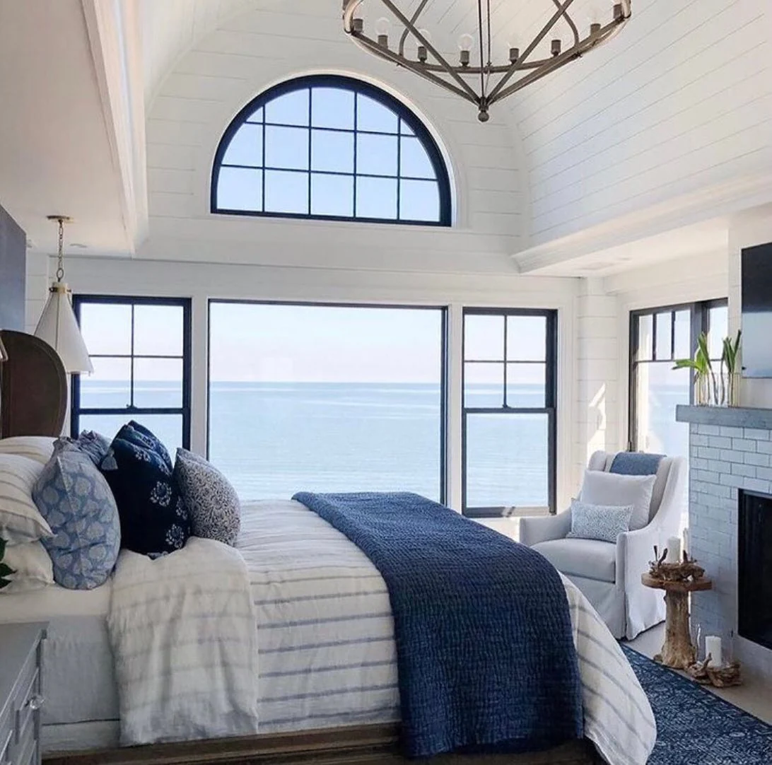 9. Oceanfront Retreat with Coastal Views (Blue and White Bedroom Ideas)