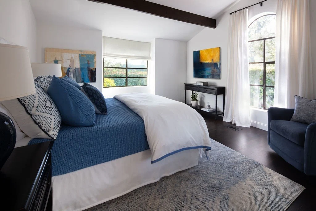 10. Art-Inspired Contemporary Comfort (Blue and White Bedroom Ideas)