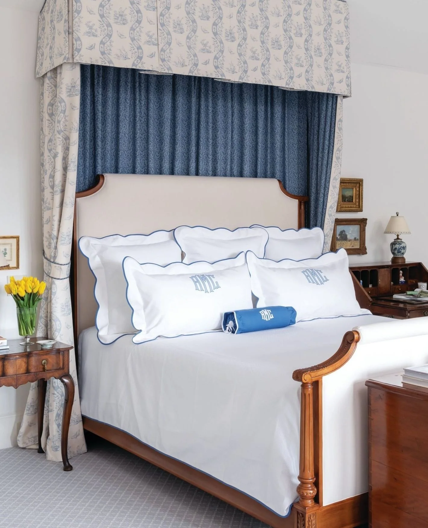 15. Monogram Elegance with Draped Canopy (Blue and White Bedroom Ideas)