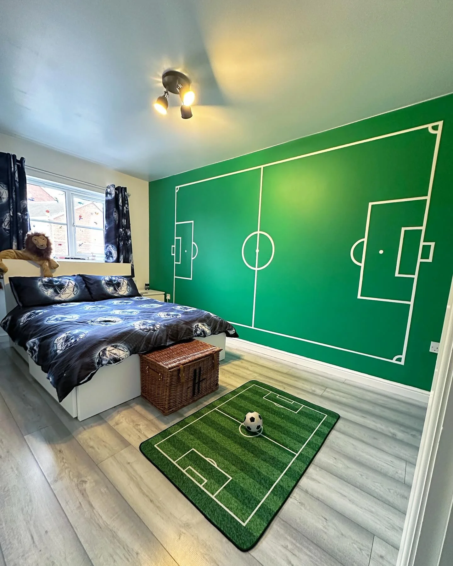 3. Pitch Perfect Green Feature Wall (Football Bedroom Ideas)