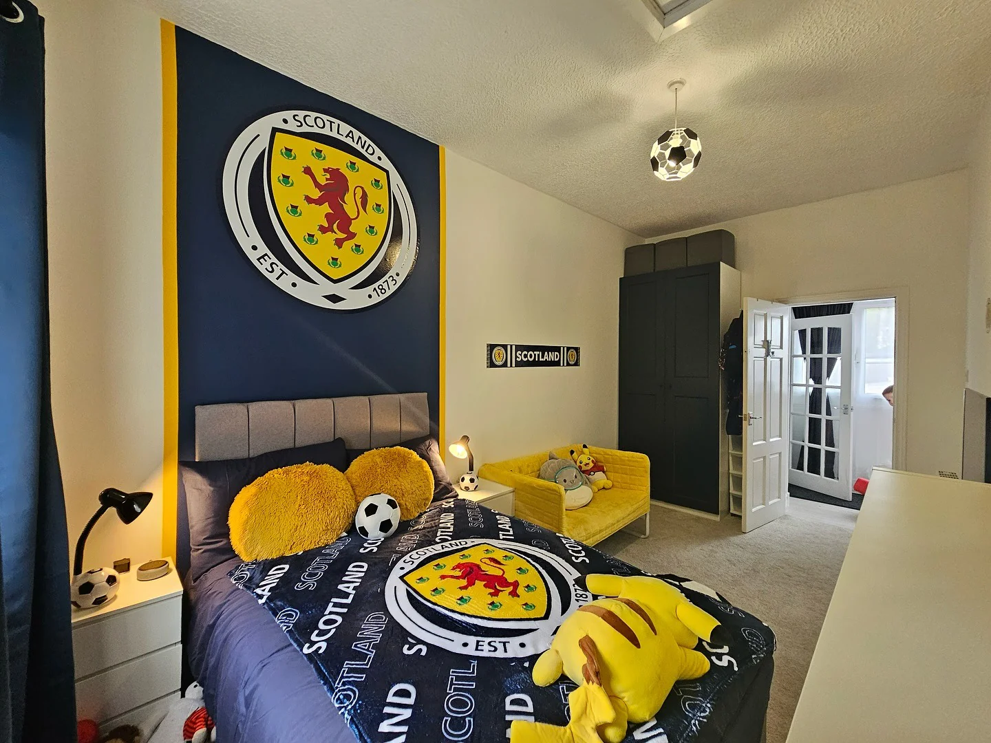 4. National Pride Football Room (Football Bedroom Ideas)