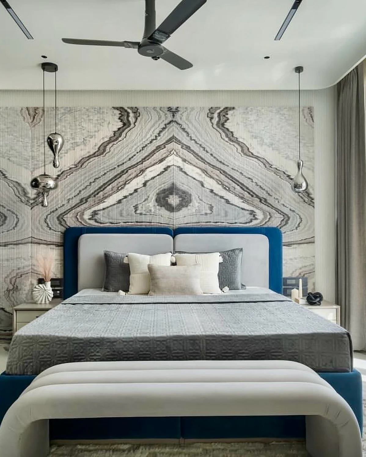 8. Bold Patterns and Sculptural Lighting (Grey Wall Bedroom Ideas)