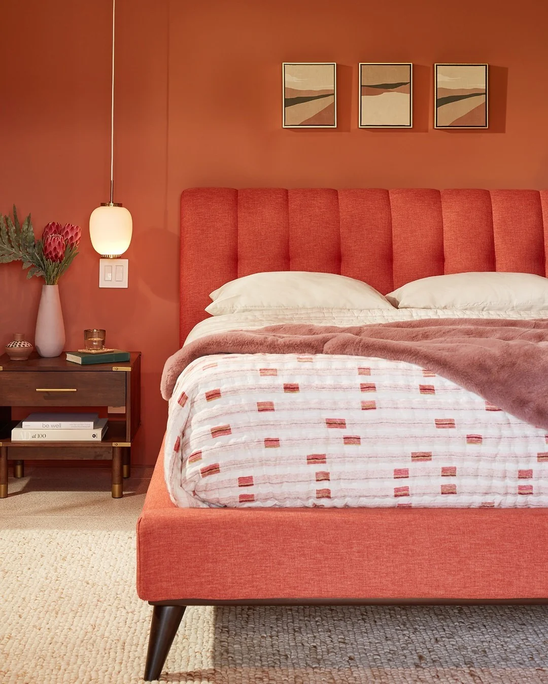 3. Mid-Century Coral Statement with Sculpted Lines (Coral Bedroom Ideas)