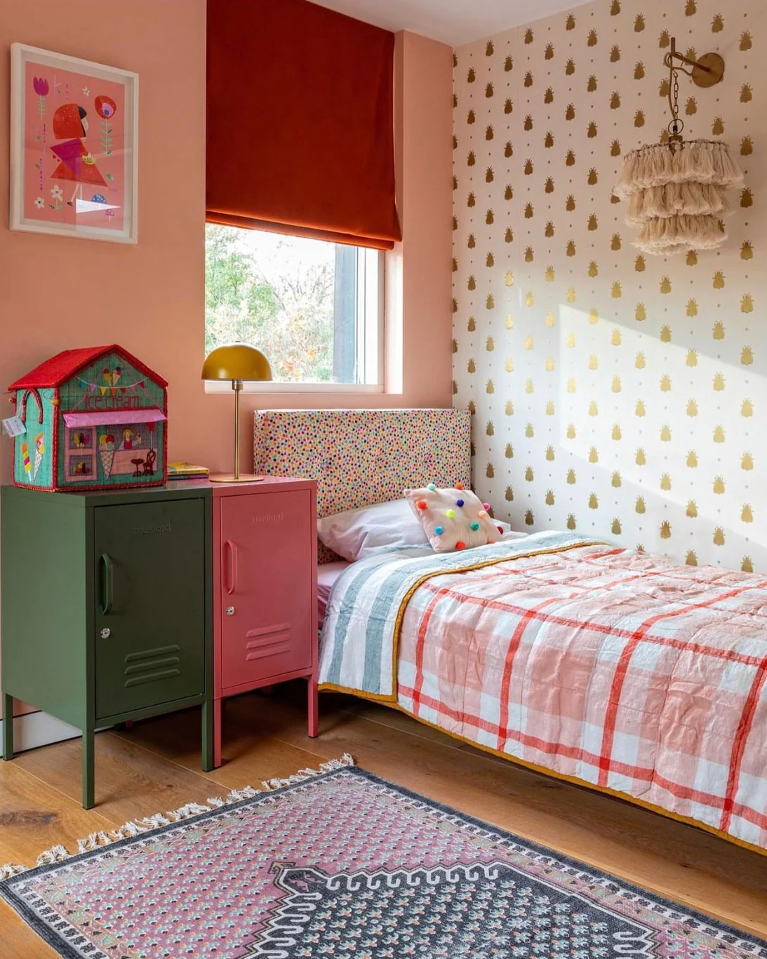 7. Playful Coral Kid’s Room with Patterned Bedding (Coral Bedroom Ideas)