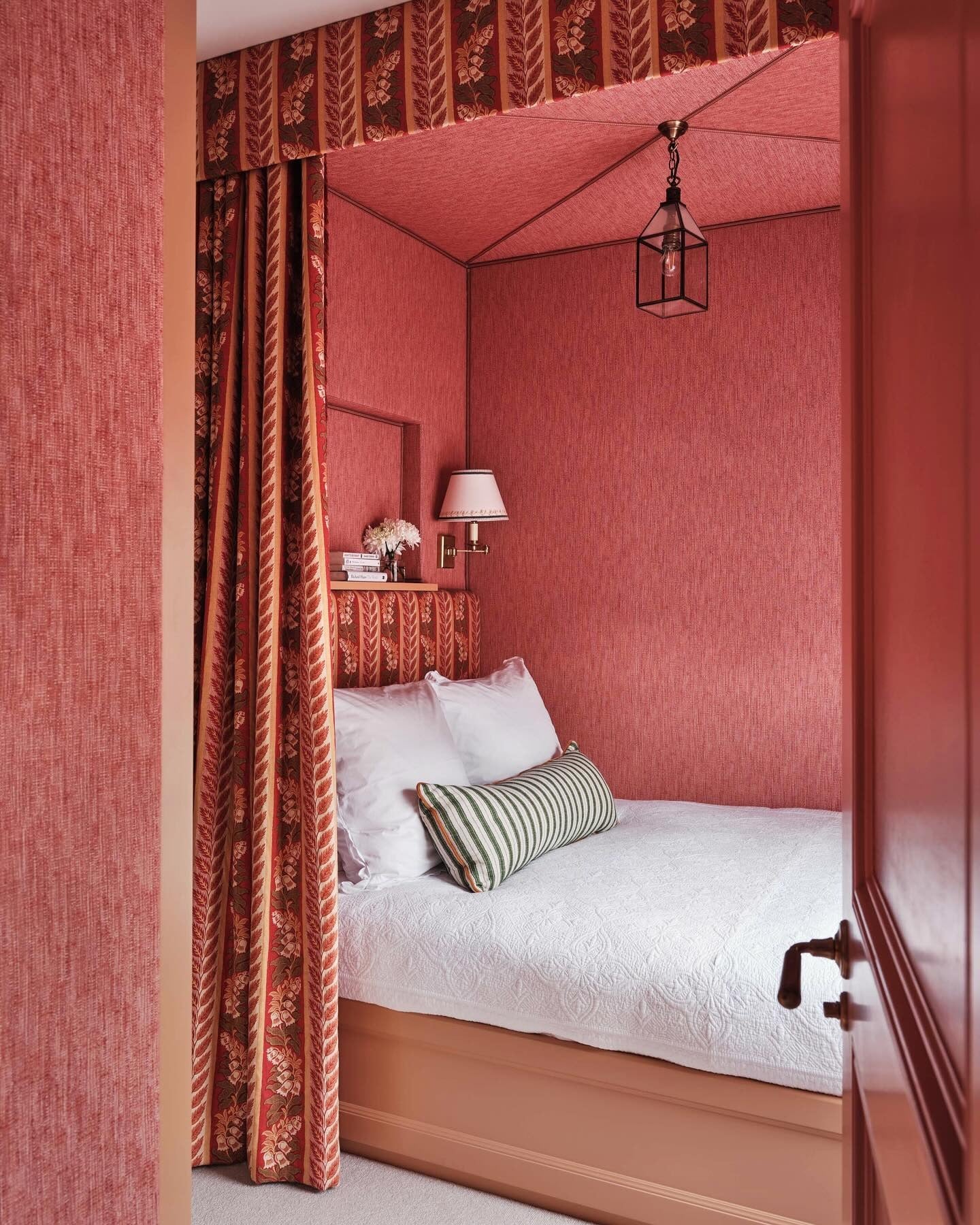 11. Cocooned Elegance in Deep Coral Drapery (Coral Bedroom Ideas)