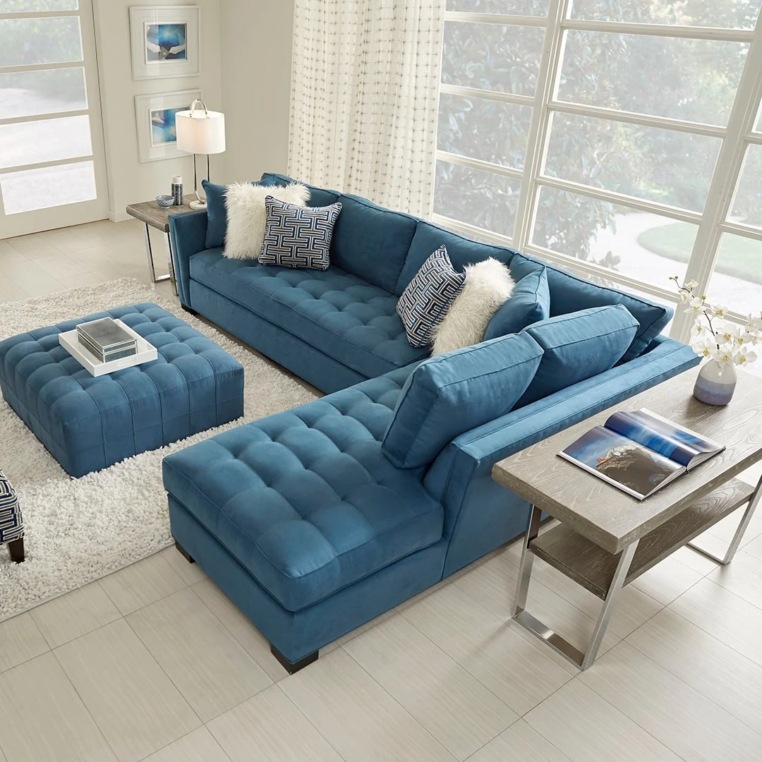 6. Sapphire Sectional with Contemporary Coastal Vibes (Sectional Living Room Ideas)