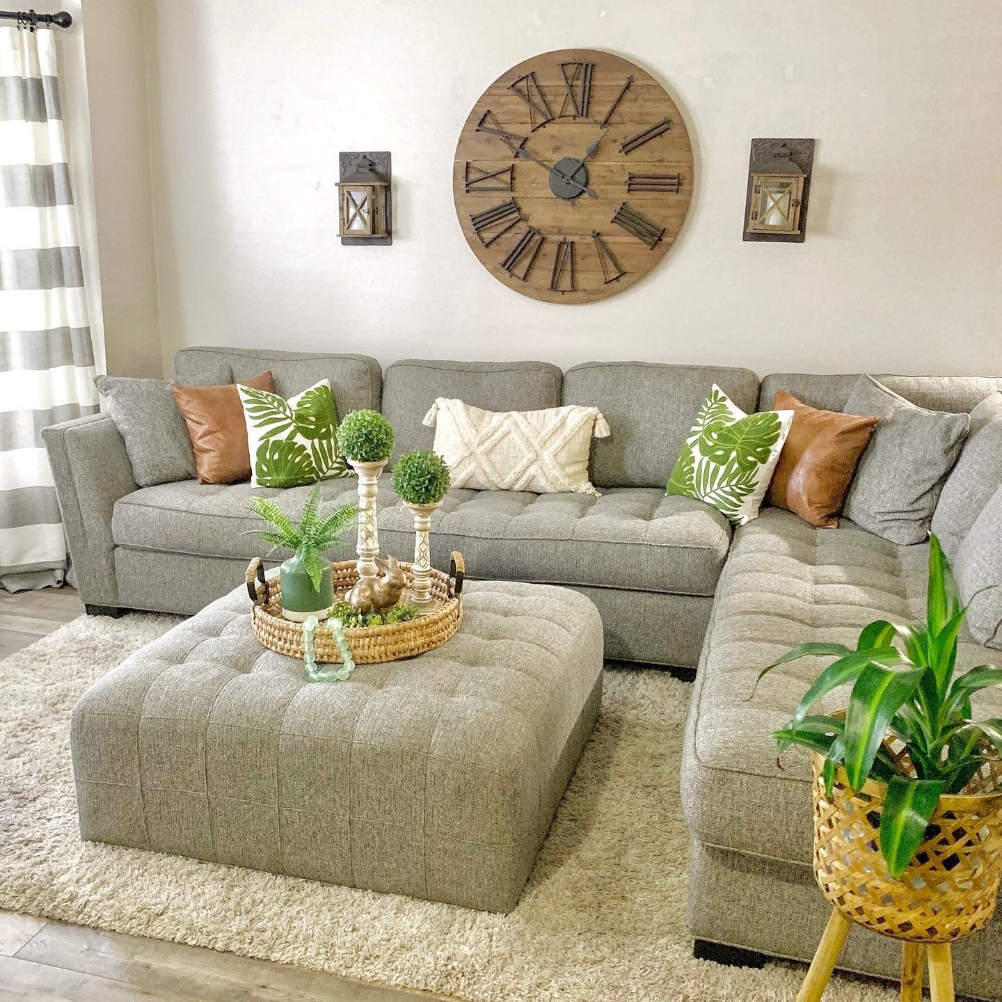 9. Layered Earth Tones with Organic Accents (Sectional Living Room Ideas)