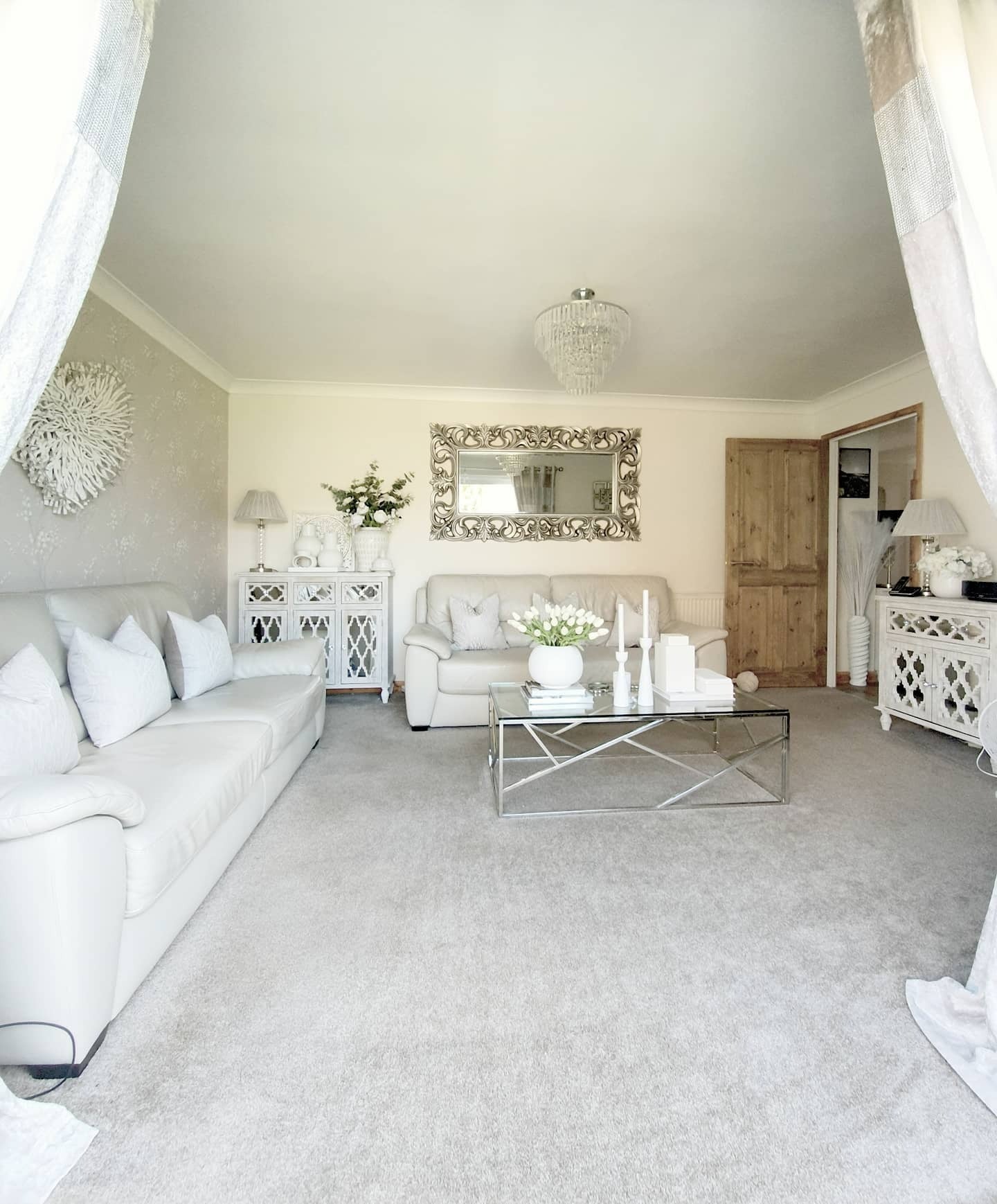 5. Bright Traditional with Ornate Accents (Mirrors in Living Room Ideas)