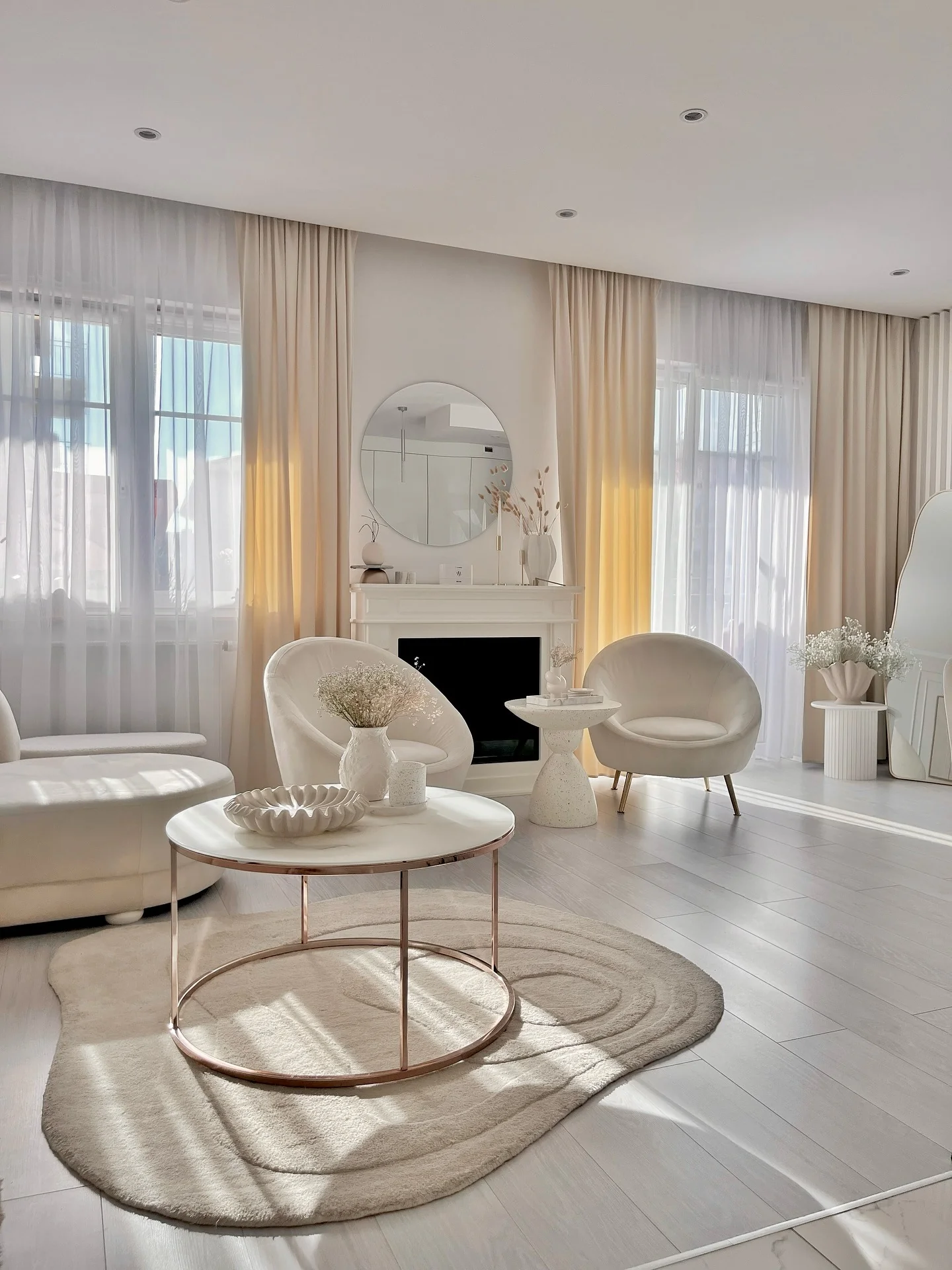 7. Soft Minimalism with Sheer Layers and Curves (Mirrors in Living Room Ideas)
