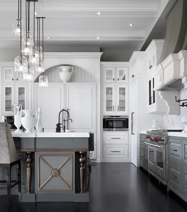 12. Luxury Statement with Classic Craftsmanship (Light Gray Kitchen Ideas)