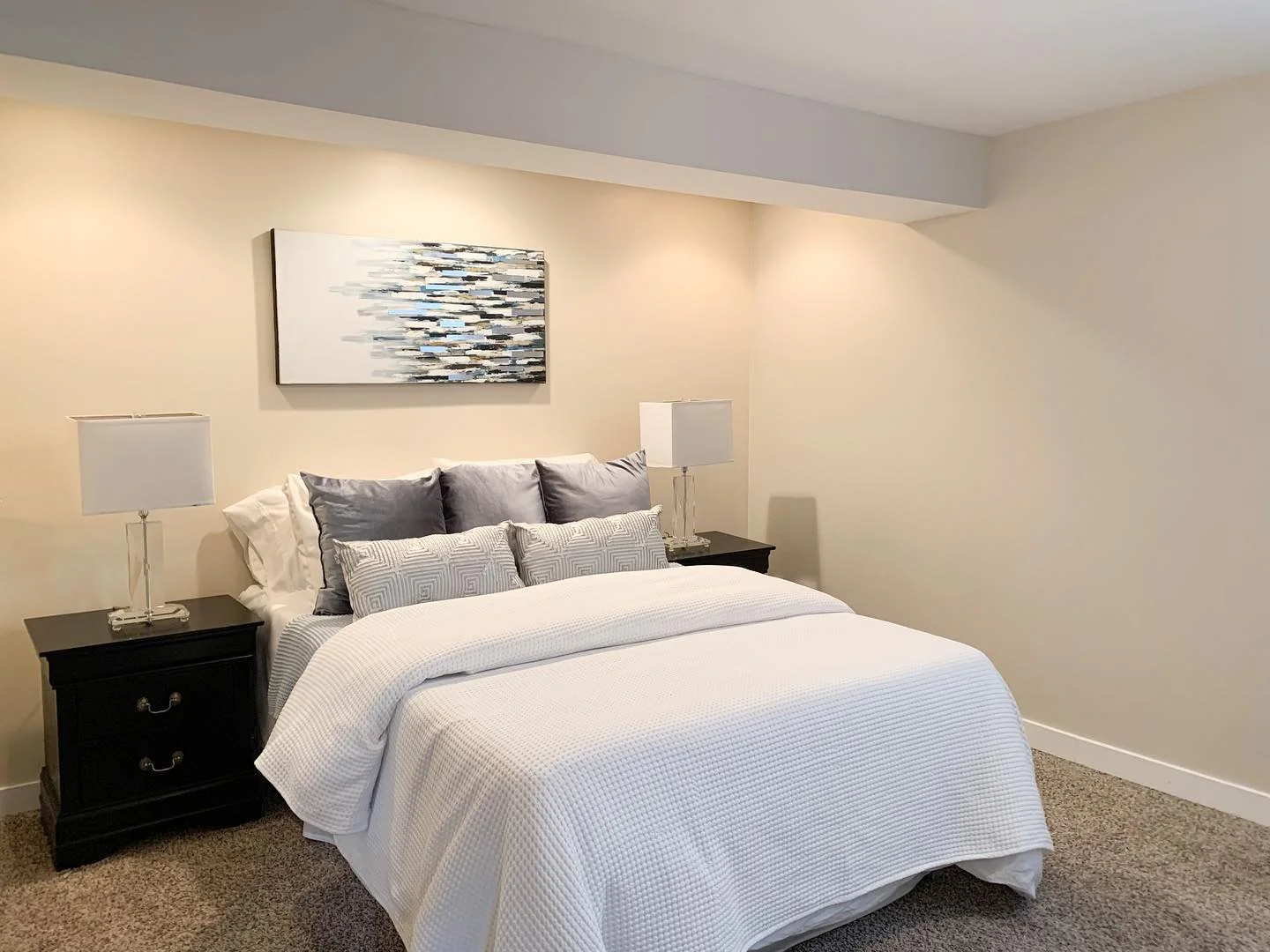 3. Neutral Calm with Contemporary Lines (Basement Bedroom Ideas)