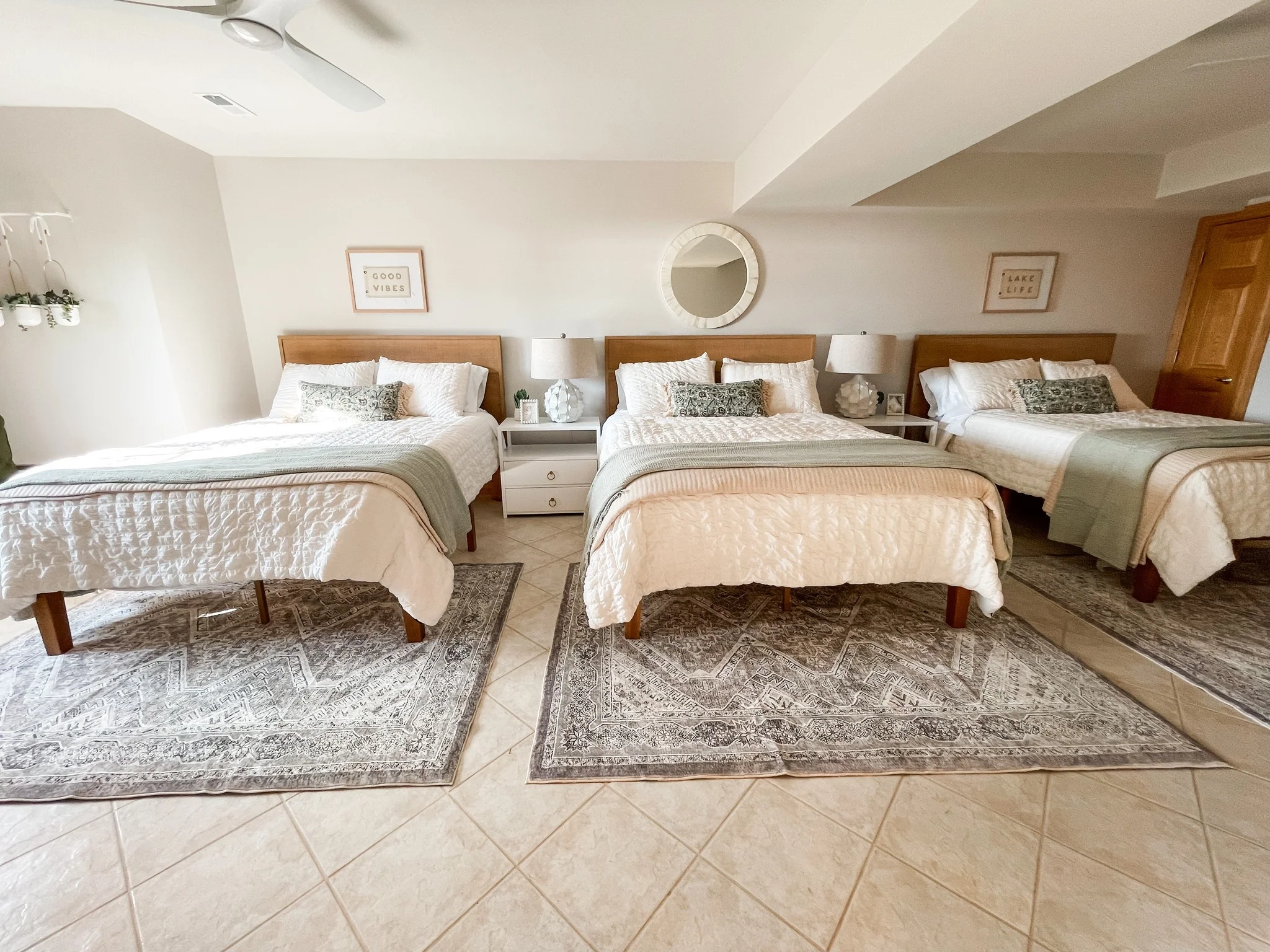 6. Triple Tranquility with Cohesive Design (Basement Bedroom Ideas)