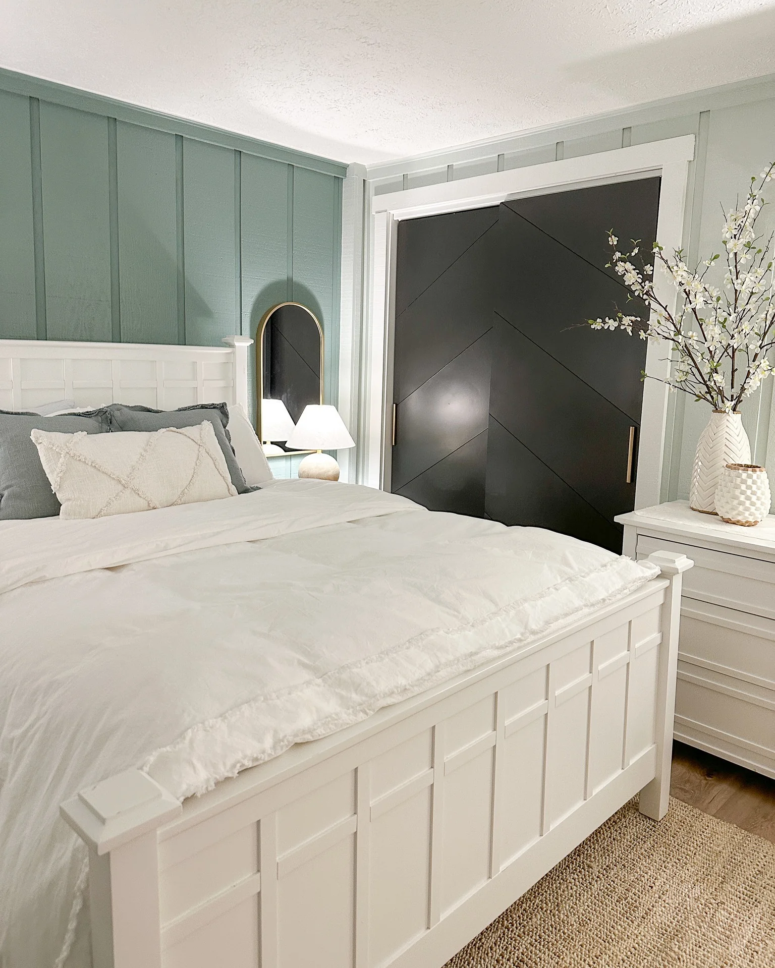 12. Soft Green Backdrop with Textured Neutrals (Basement Bedroom Ideas)