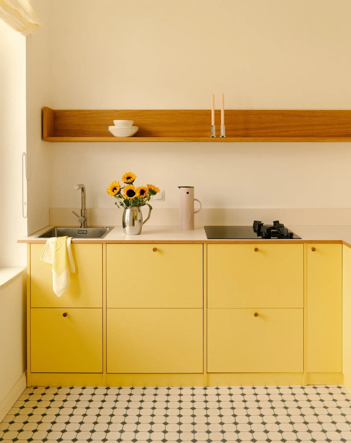 7. Light Butter Yellow with Graphic Floor Pattern (Yellow Kitchen Ideas)