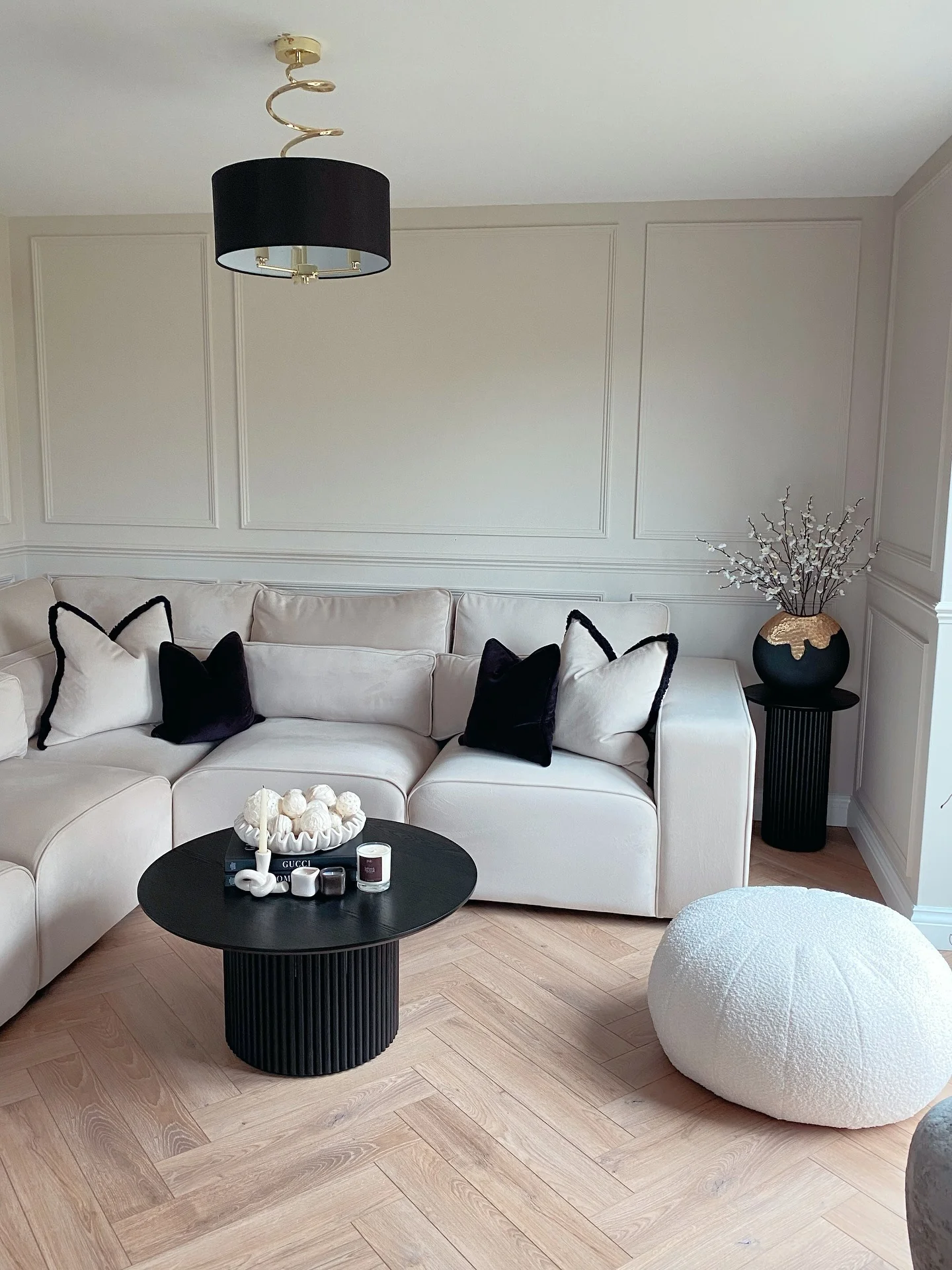 2. Contemporary Chic in Soft Beige and Jet Black (Home Decor Ideas for Living Room)