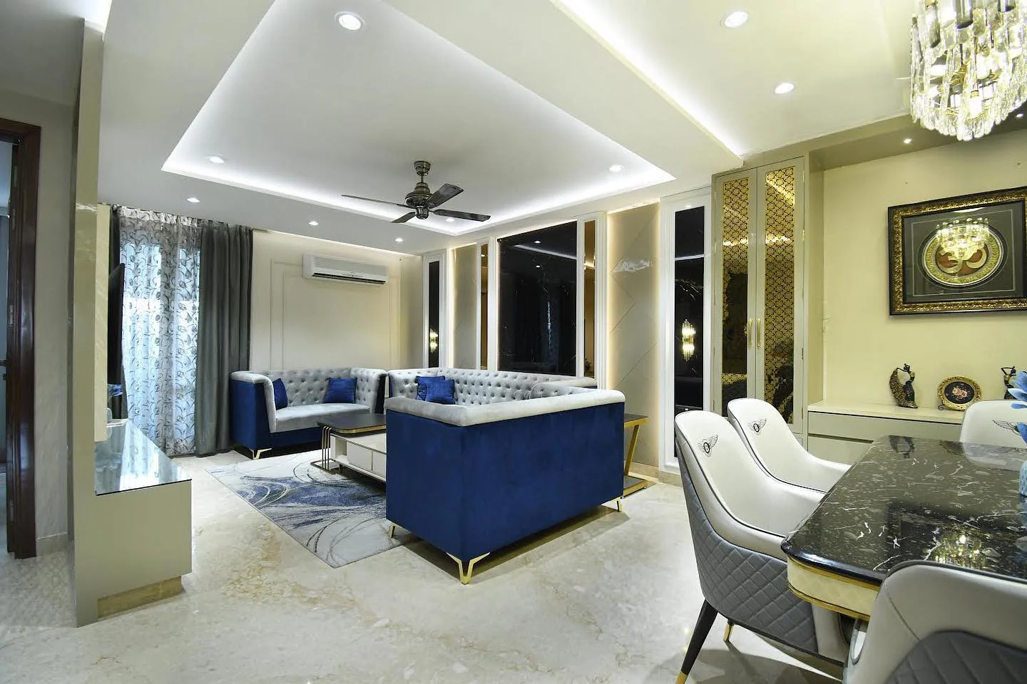 2. Luxe Contrast with Royal Blue and Greyscale Neutrals (Royal Blue Living Room Ideas)