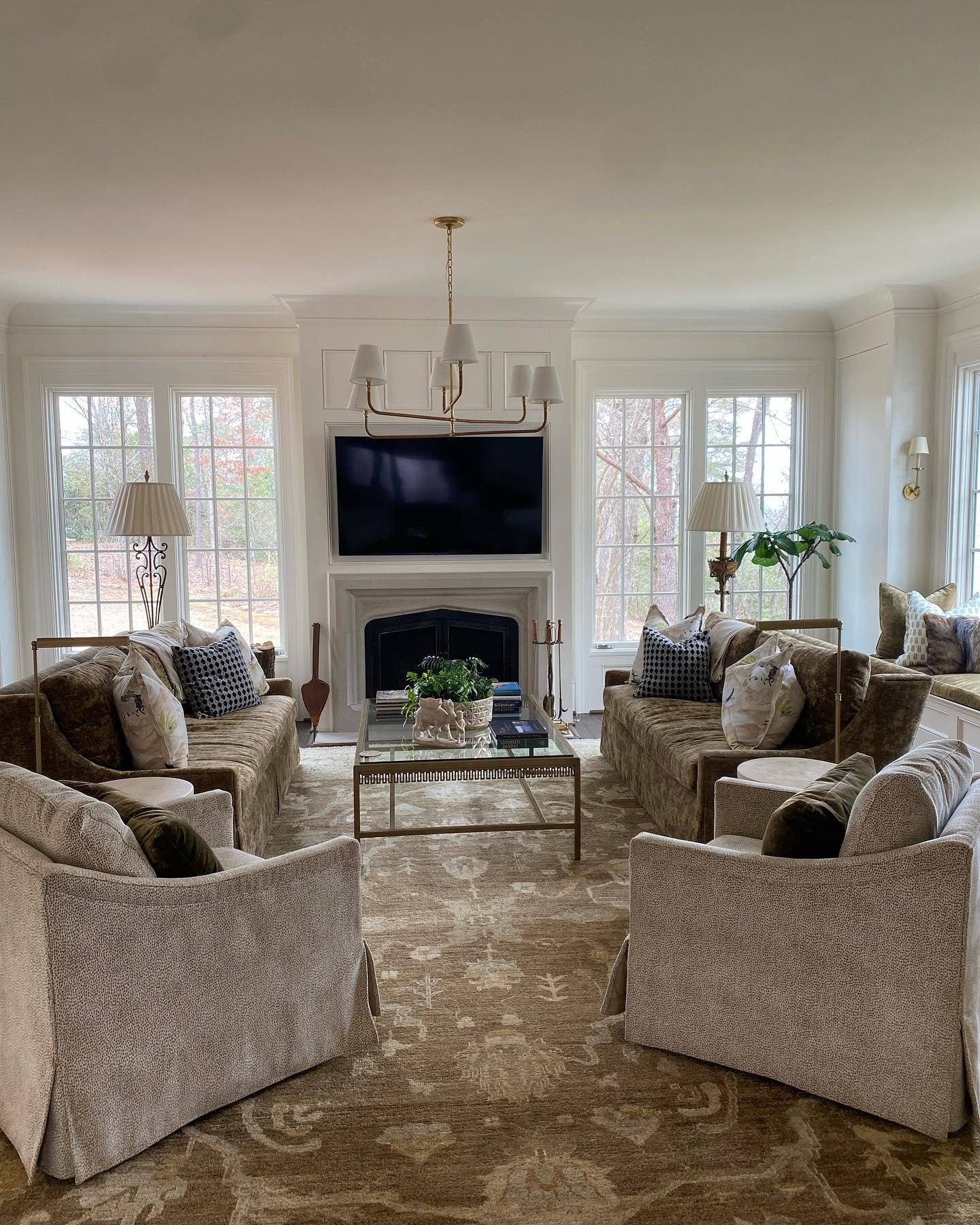 14. Layered Neutrals with Symmetrical Chandelier Focus (Lighting Ideas for Living Room)