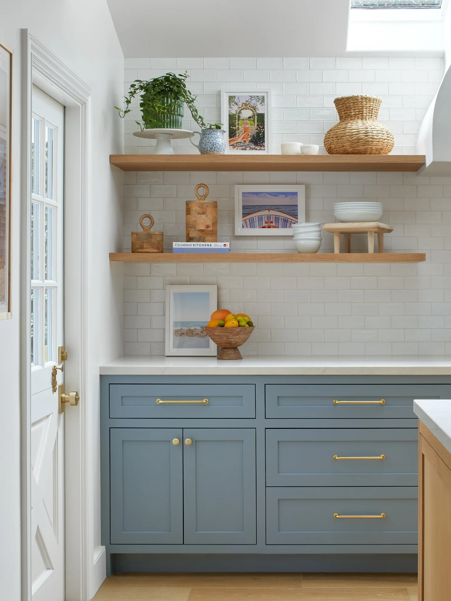 7. Powder Blue Cabinets with Polished Brass (Kitchen Ideas with Shelves)