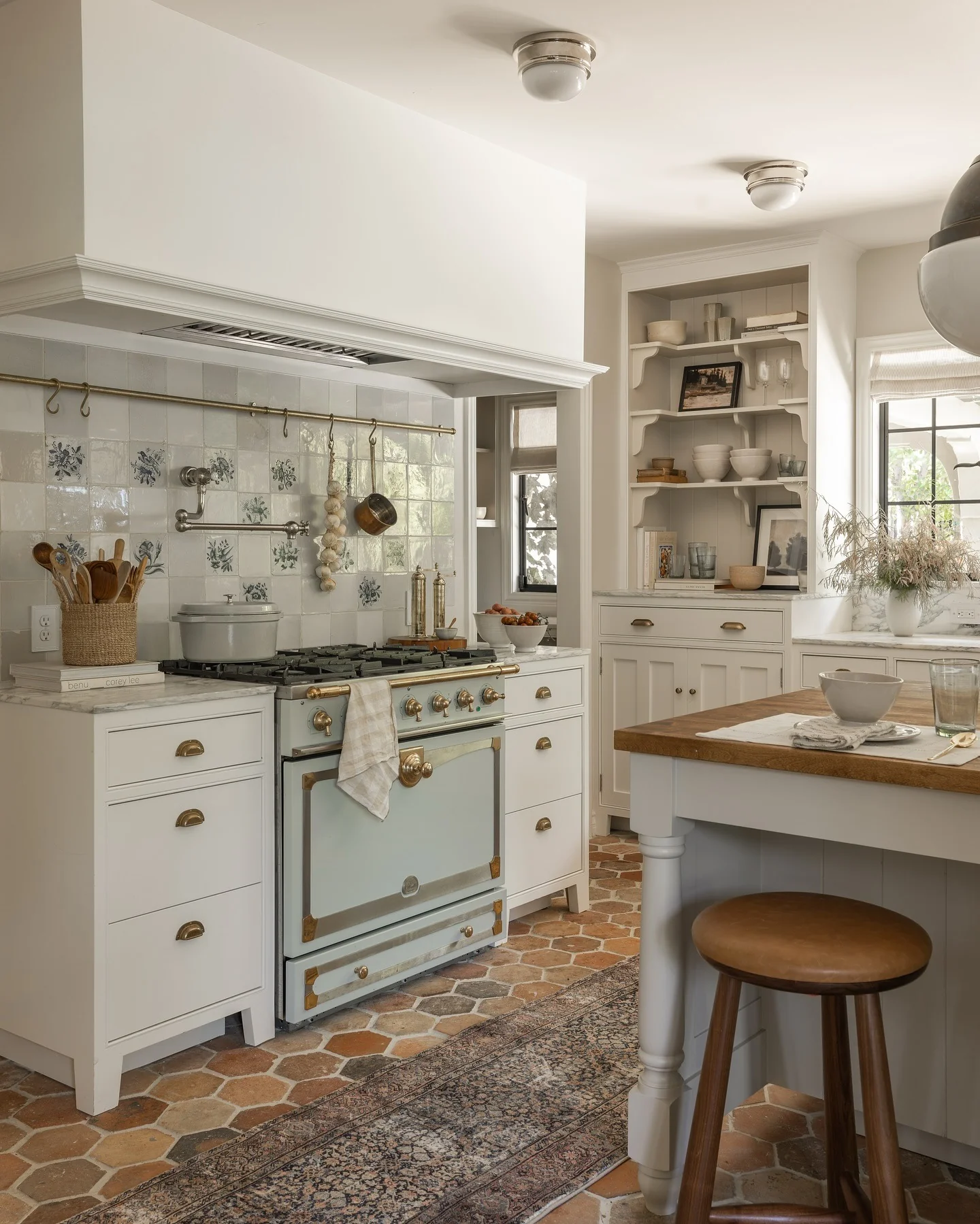 10. French Country Style with Heritage Tile (Kitchen Ideas with Shelves)