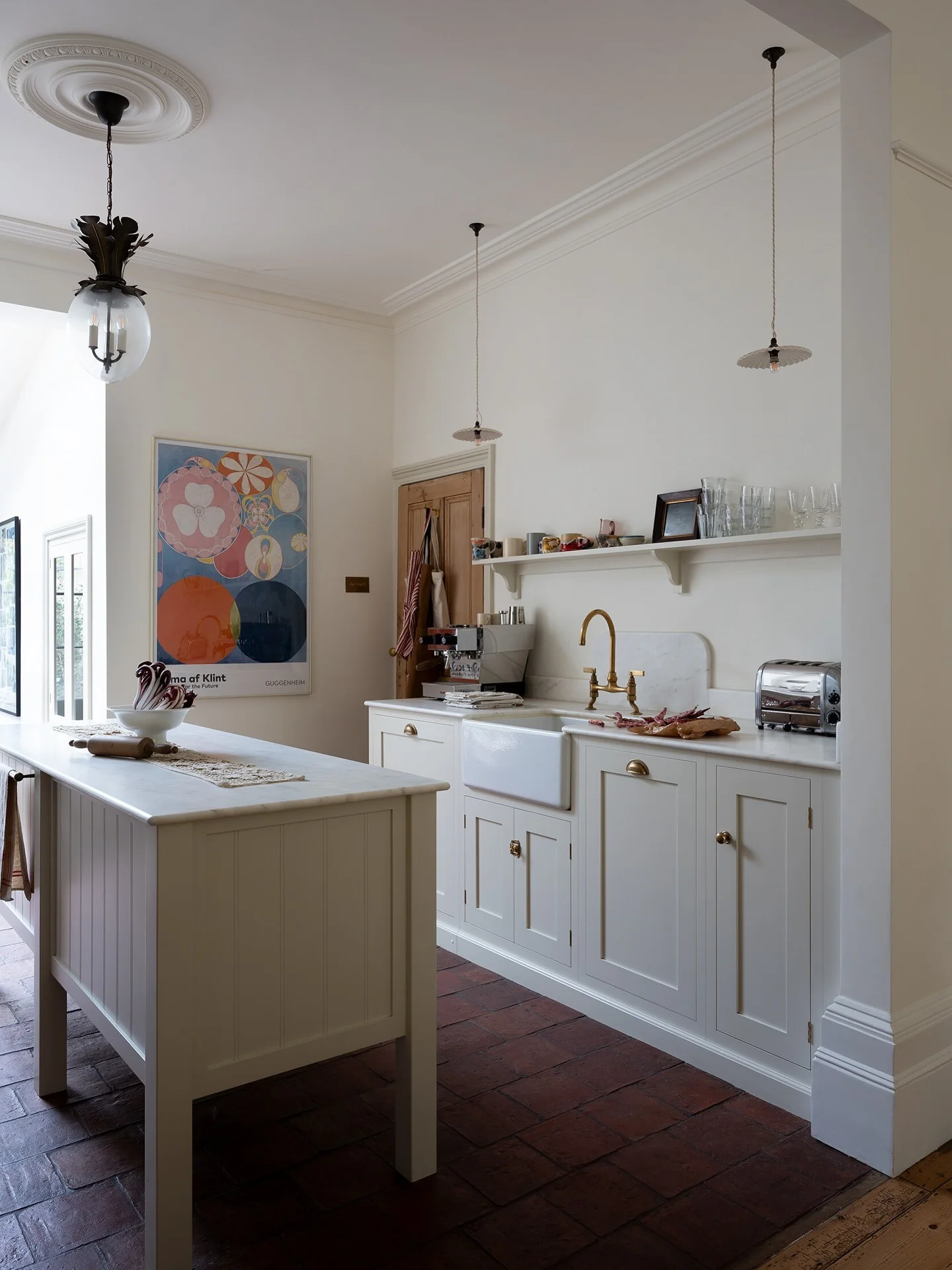 12. Classic Ivory Cabinets with Brick Flooring (Kitchen Ideas with Shelves)