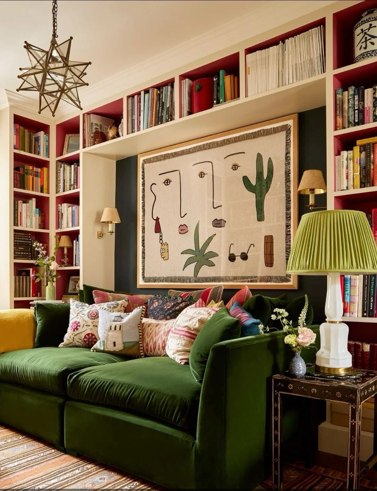 2. Bold Bookshelf Living Room with Deep Green Velvet (Green Couch Living Room Ideas)