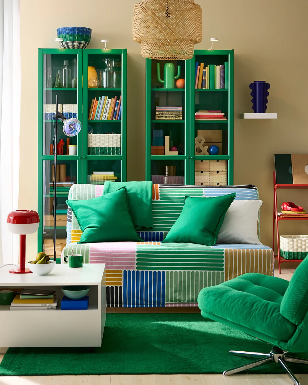 11. Playful Graphic Living Room with Forest Green Storage (Green Couch Living Room Ideas)