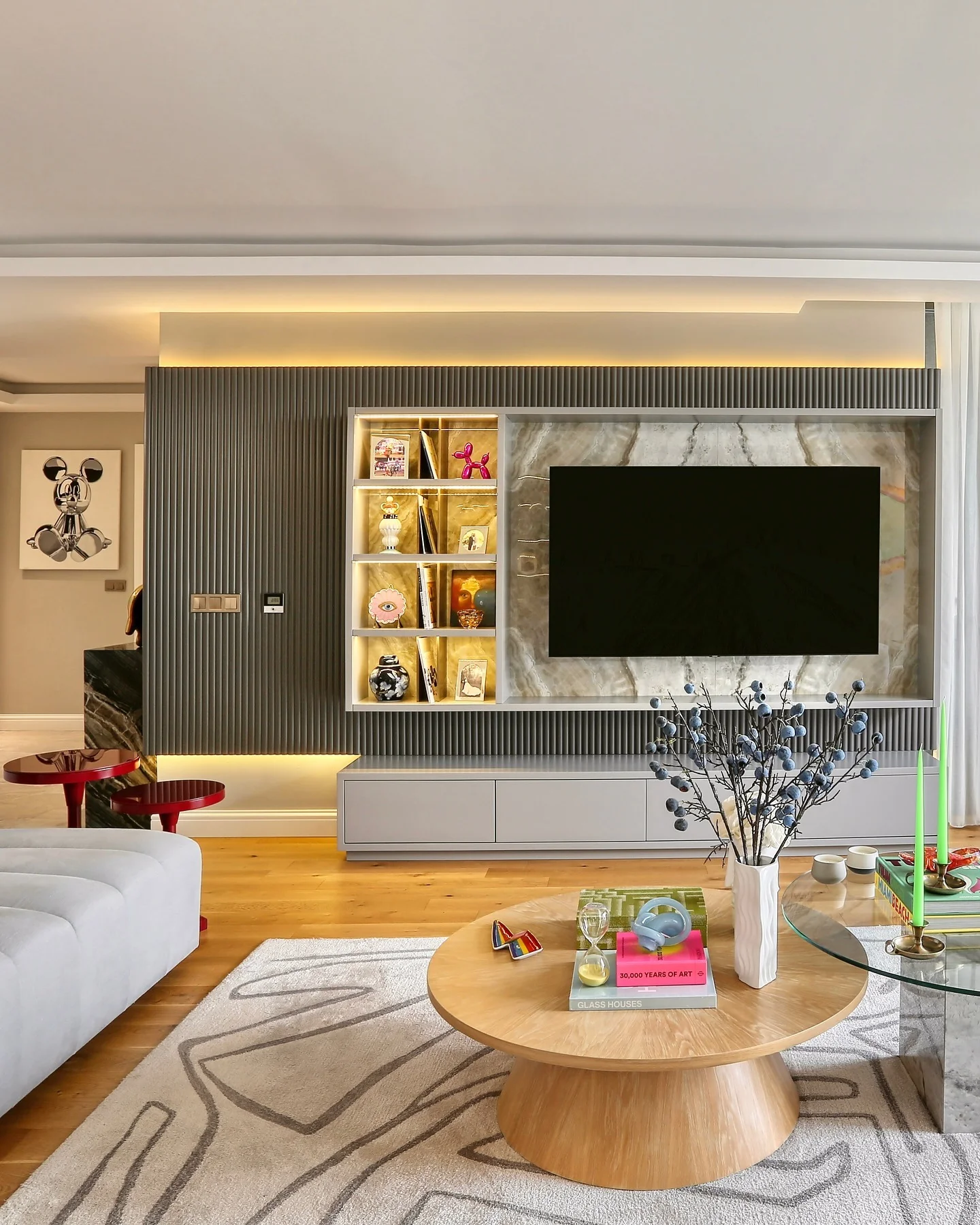 6. Contemporary Display with Natural Accents (Living Room Carpet Ideas)