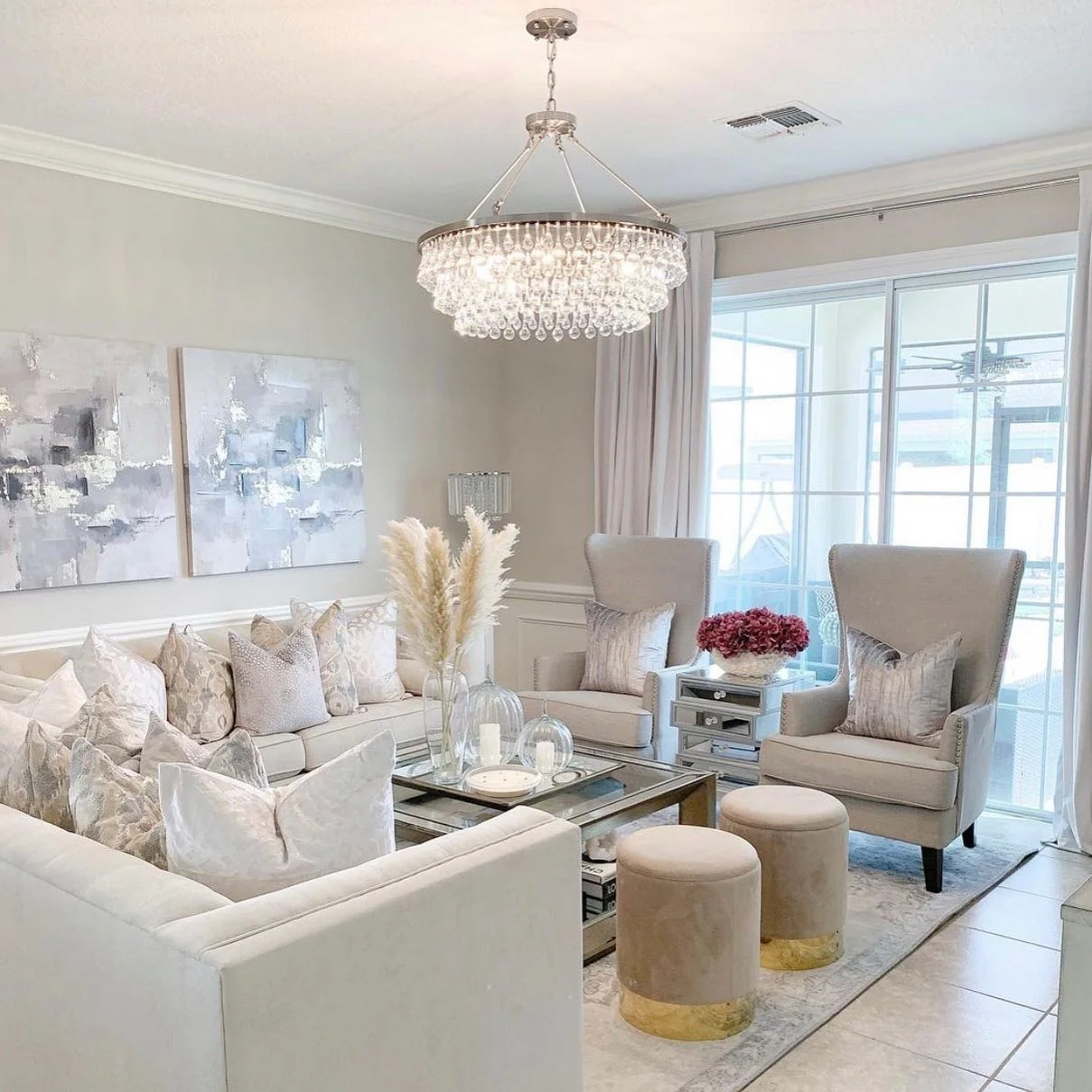 2. Crystal Elegance in Soft Neutrals (Glam Living Room Ideas)