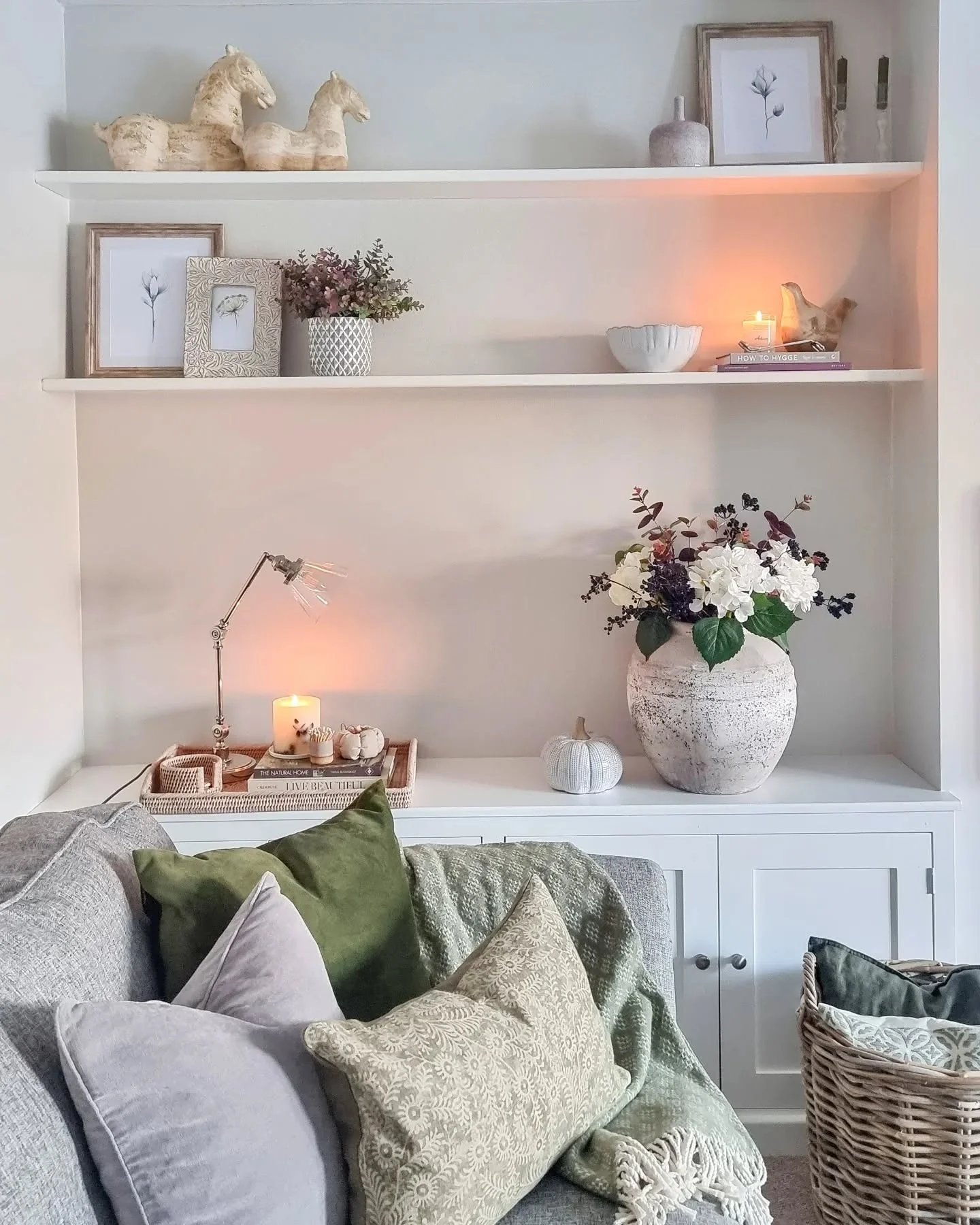 3. Soft Cottage Touches with Cozy Accents (Living Room Shelf Ideas)