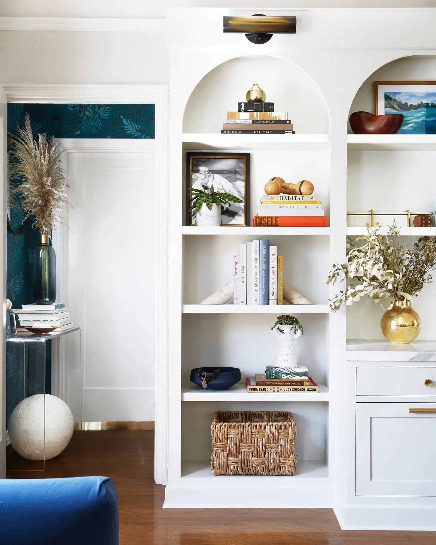 8. Classic White Built-Ins with Sculptural Decor (Living Room Shelf Ideas)