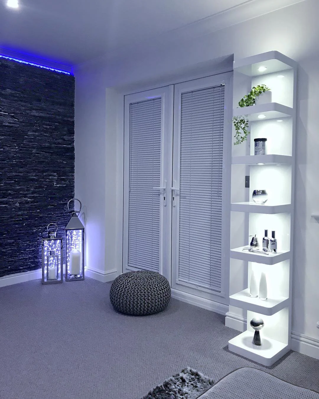 5. Futuristic Contrast with Accent Lighting (Living Room Shelf Ideas)