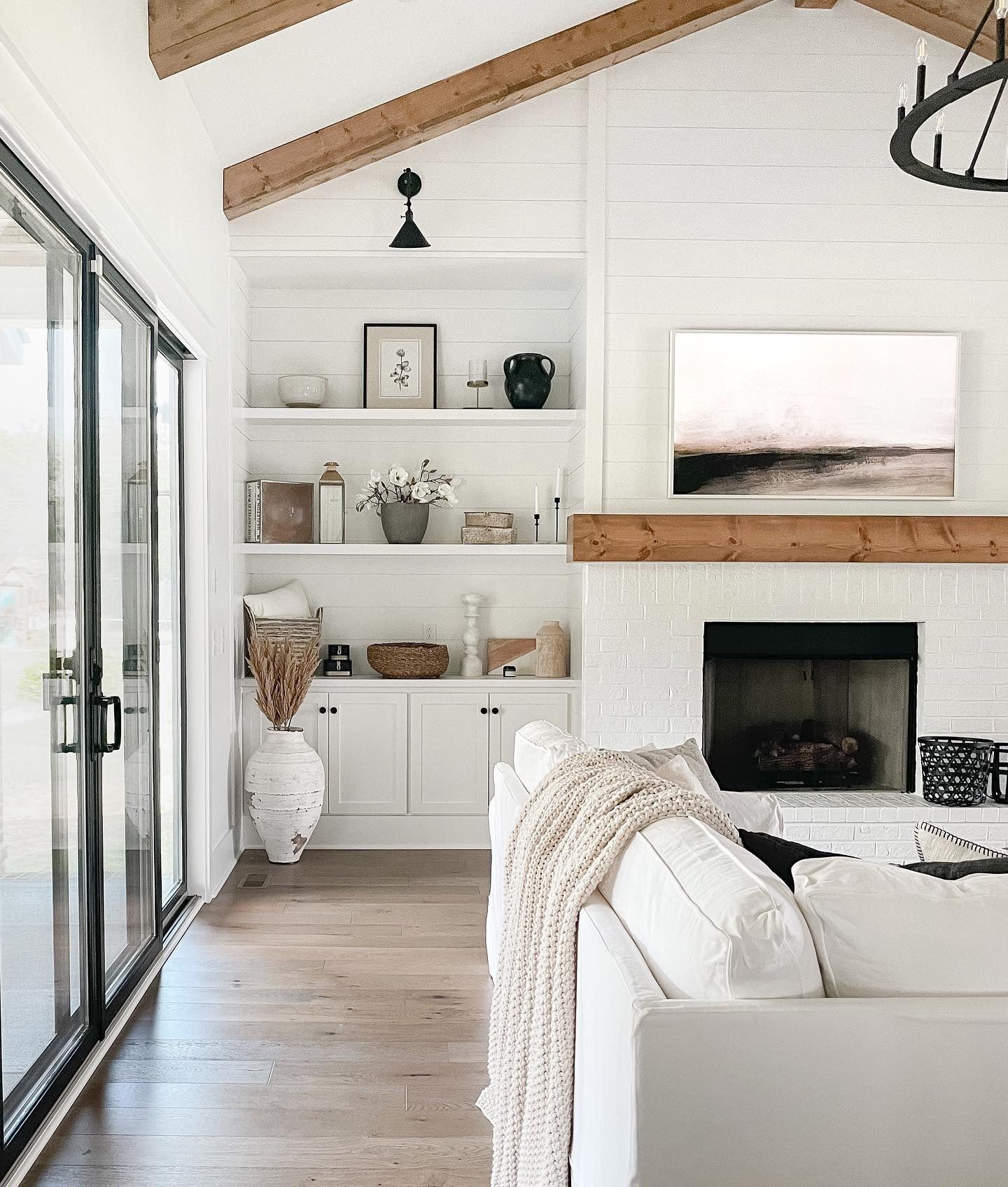 12. Modern Farmhouse White with Wood Beam Detail (Living Room Shelf Ideas)
