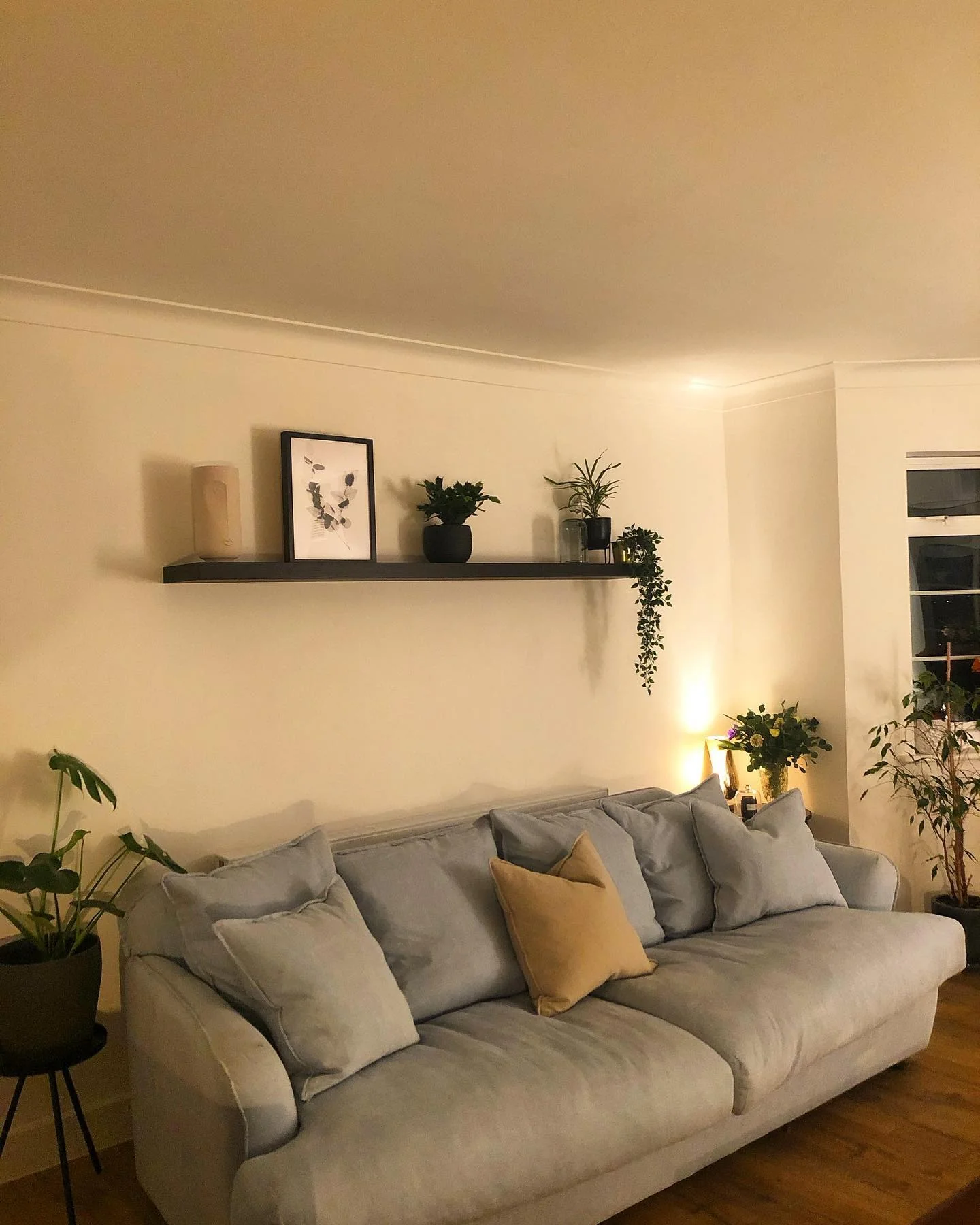 10. Warm Minimalism with Elevated Shelf Styling (Living Room Shelf Ideas)