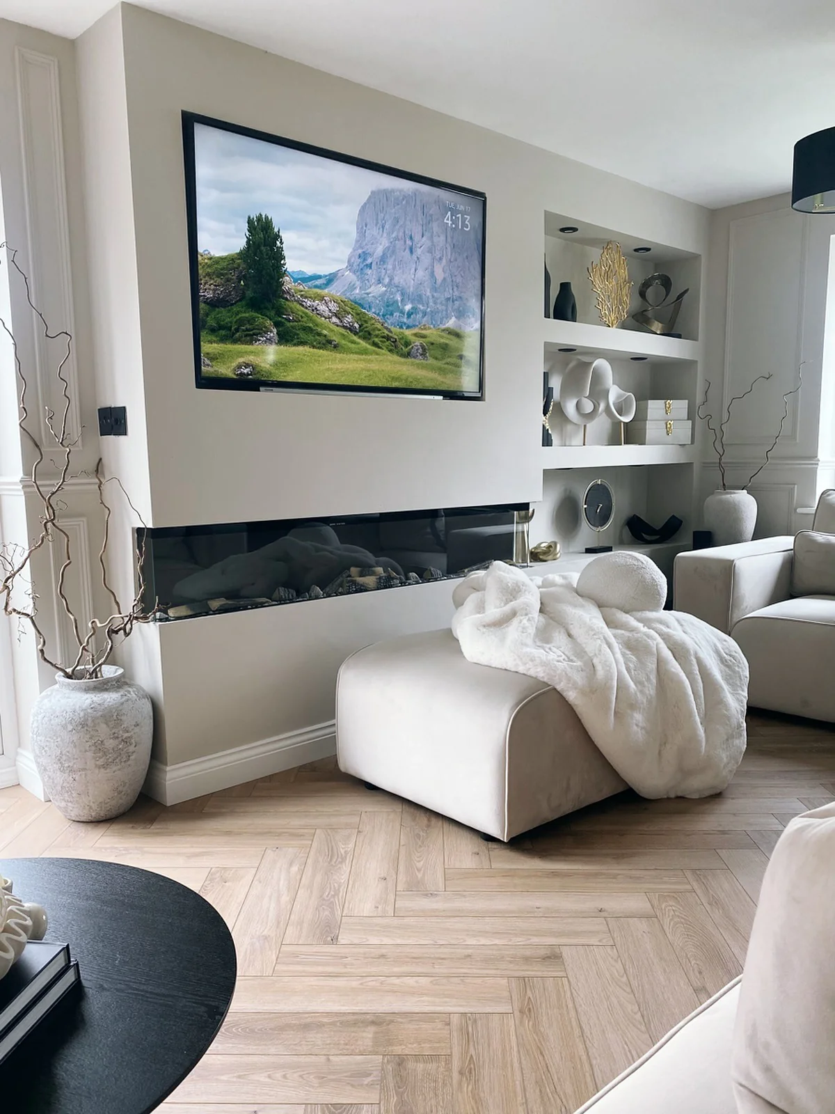 3. Cozy Minimalism in Sandy Taupe and Gray (Gray and White Living Room Ideas)