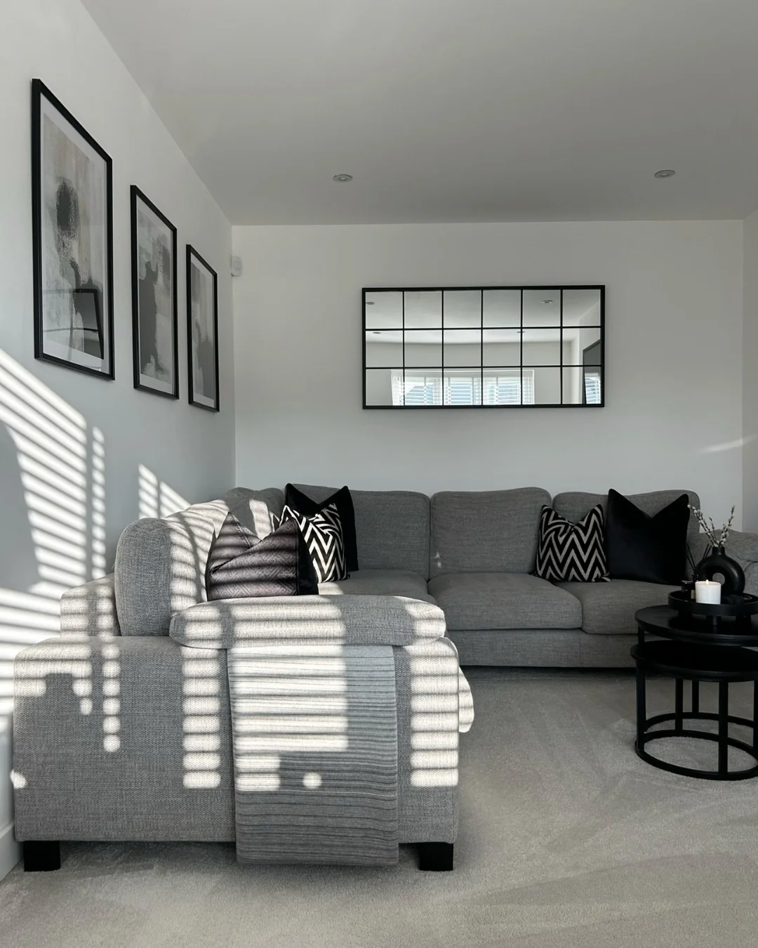 10. Sharp Contrast in a Tailored Space (Gray and White Living Room Ideas)