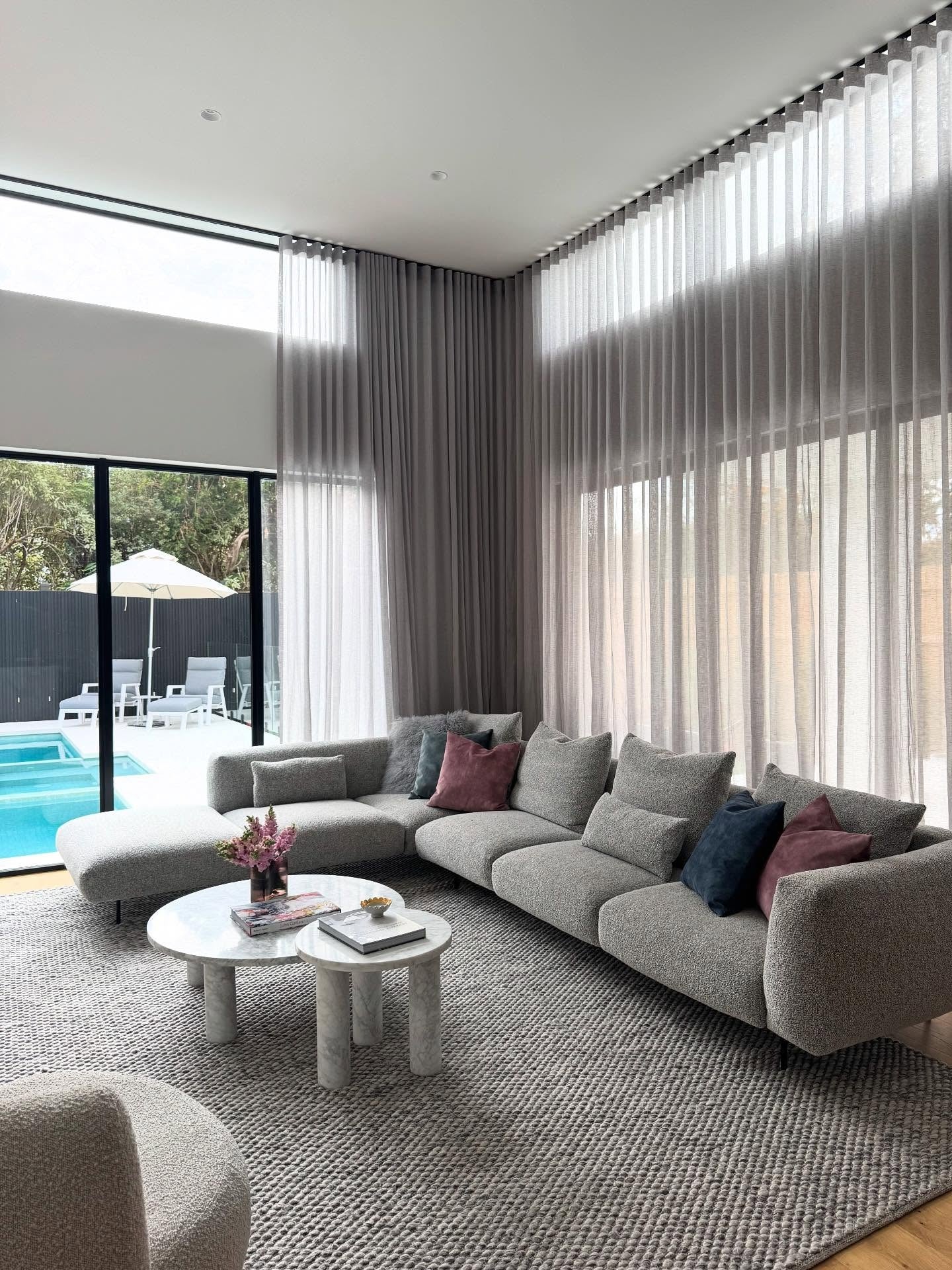 12. Soft Geometry by the Pool (Gray and White Living Room Ideas)