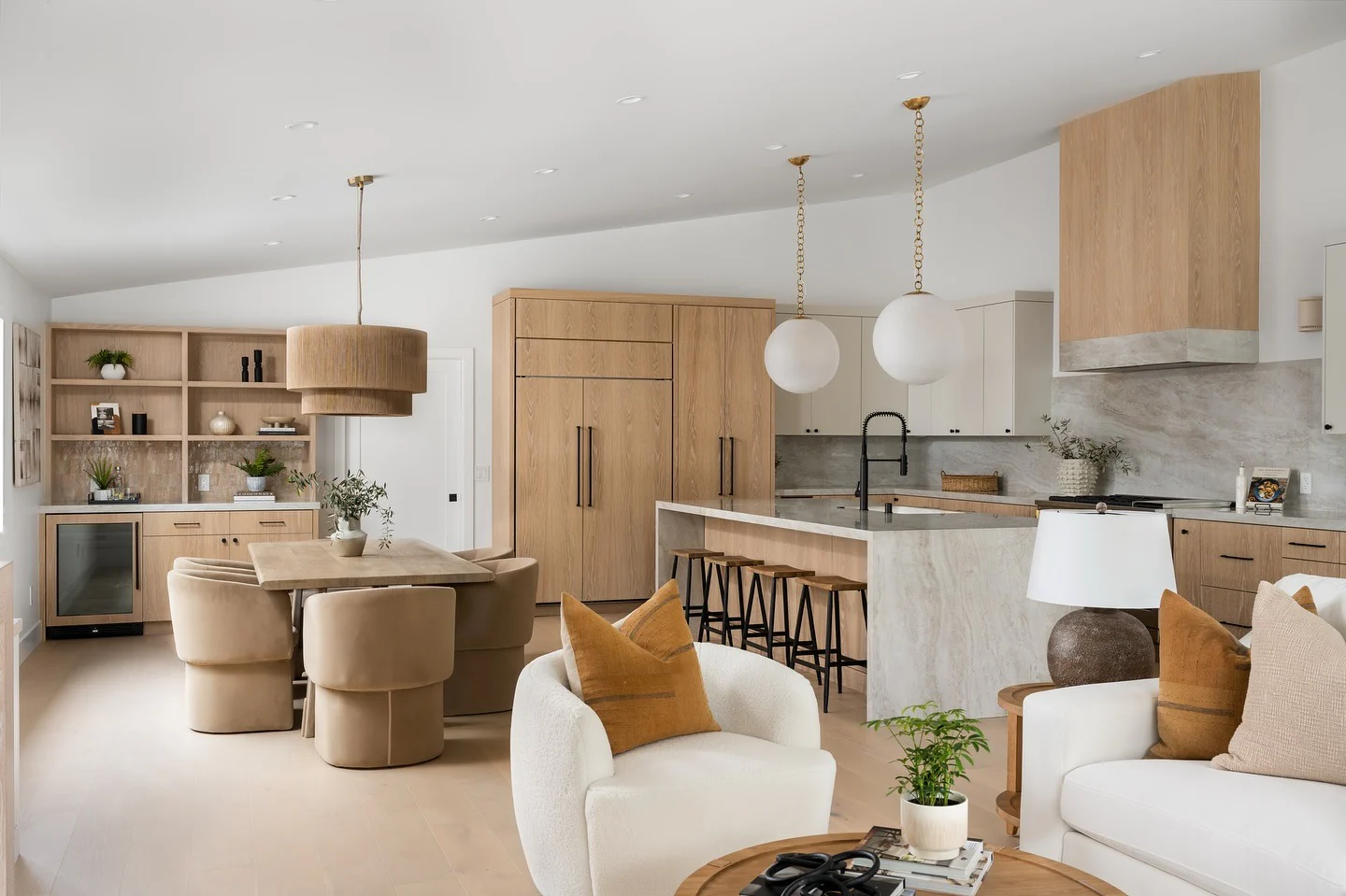 11. Earth-Toned Layers with Modern Texture (Open Kitchen Living Room Ideas)