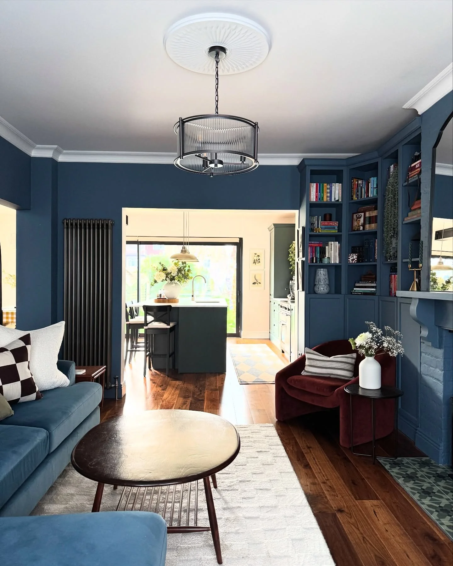 13. Moody Contrast with Jewel Accents (Open Kitchen Living Room Ideas)