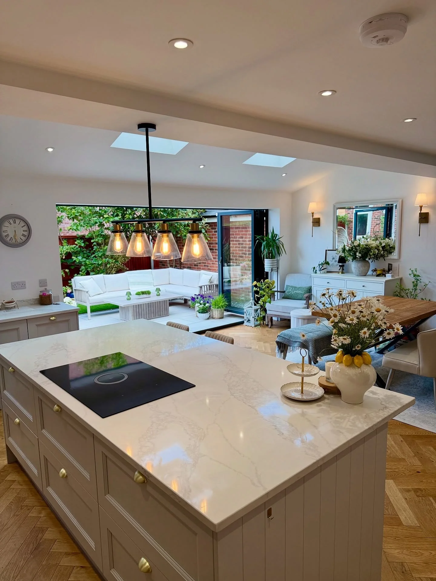 16. Garden-Facing Elegance with Cream and Brass (Open Kitchen Living Room Ideas)