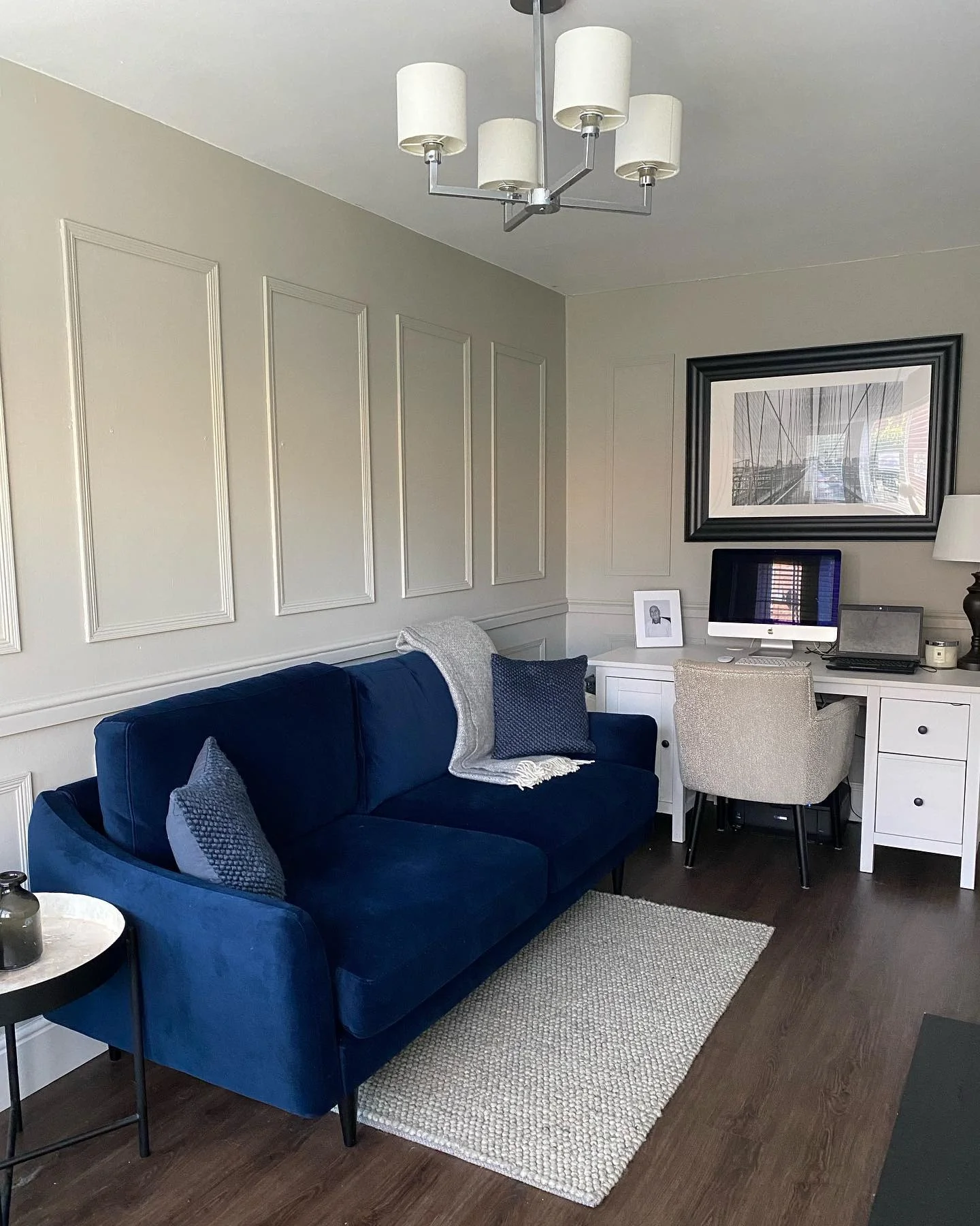 2. Classic Contrast with Tailored Details (Living Room Office Ideas)