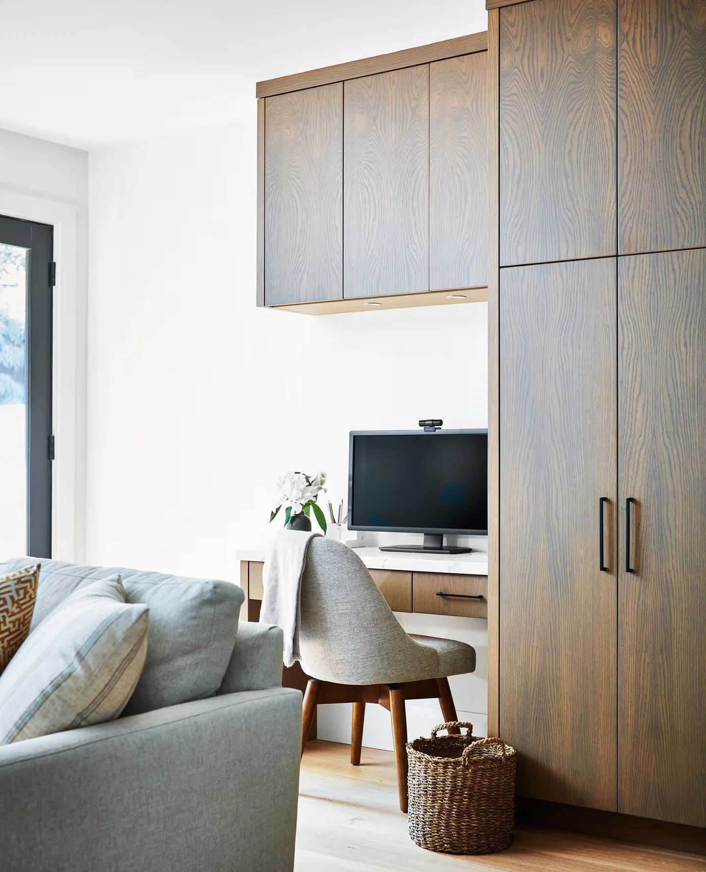 6. Integrated Storage and Subtle Sophistication (Living Room Office Ideas)