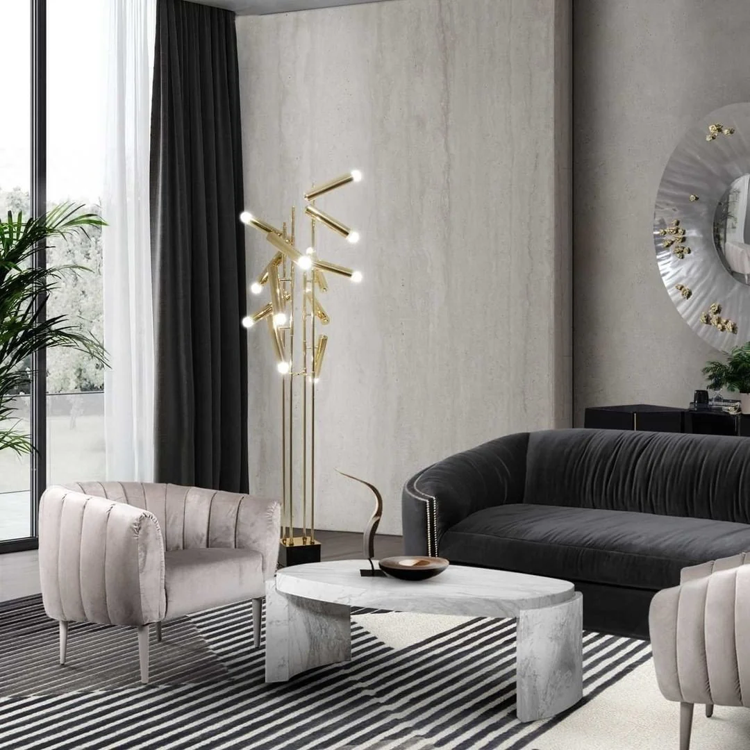 3. Chic Sculptural Modernism in Grey Marble and Gold (Grey and Gold Living Room Ideas)