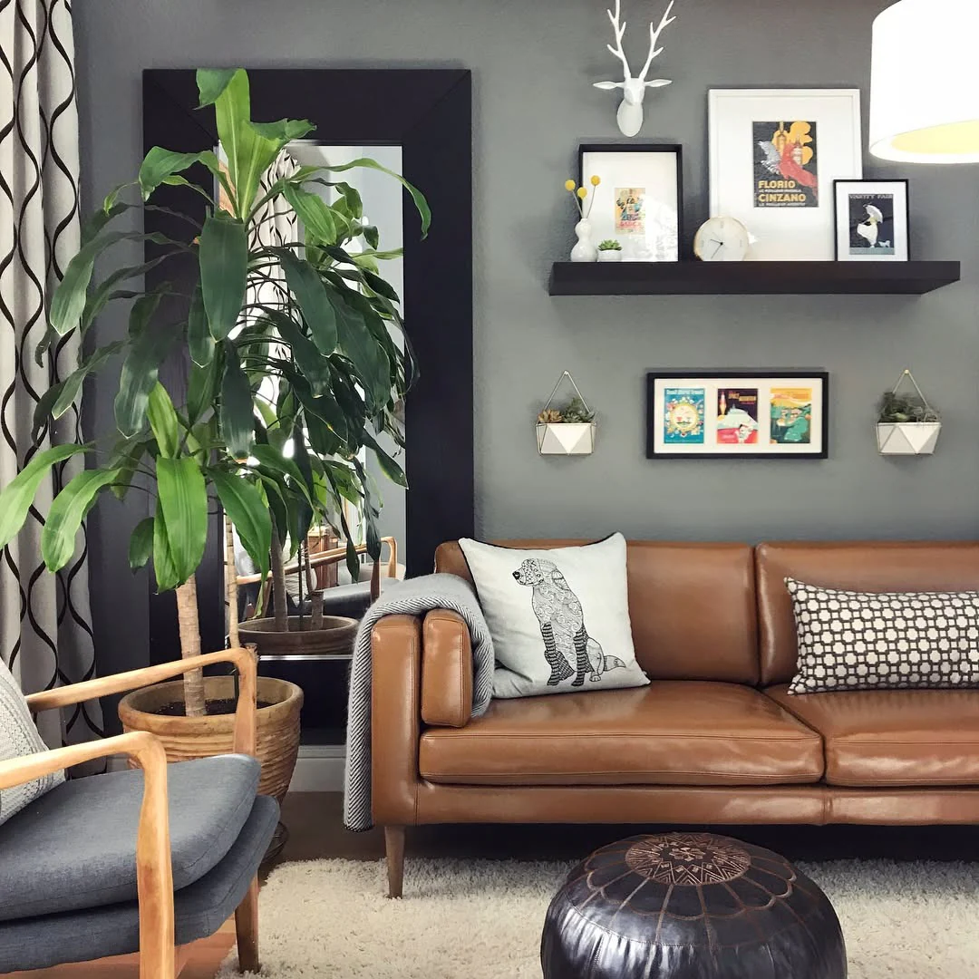 3. Eclectic Industrial Charm (Brown Leather Sofa Living Room Ideas)