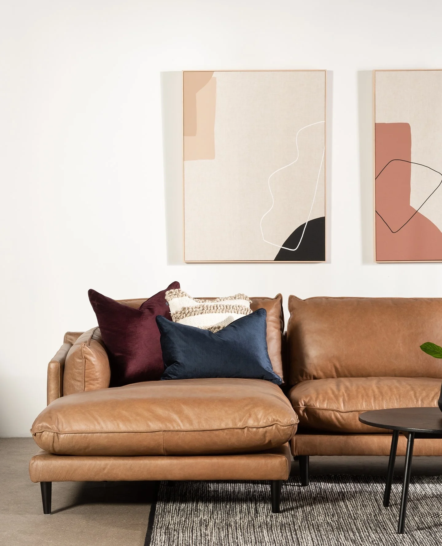 2. Minimal Modern with Color Blocking (Brown Leather Sofa Living Room Ideas)