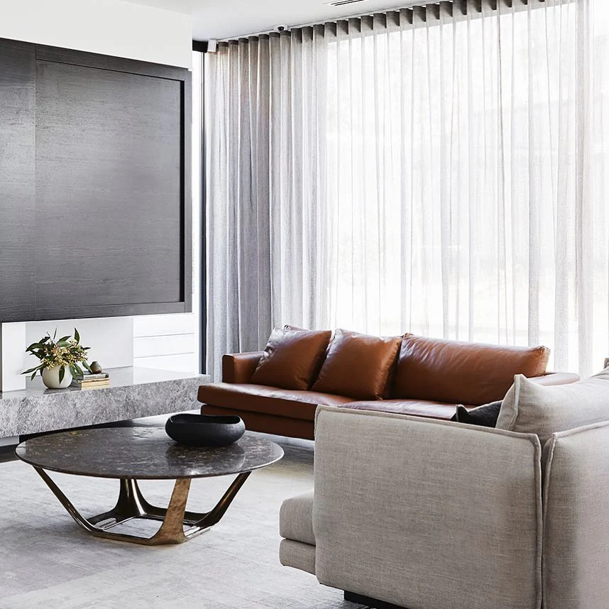 4. Understated Elegance with Clean Lines (Brown Leather Sofa Living Room Ideas)