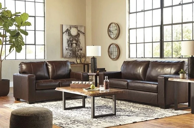 7. Urban Loft Style with Natural Light (Brown Leather Sofa Living Room Ideas)