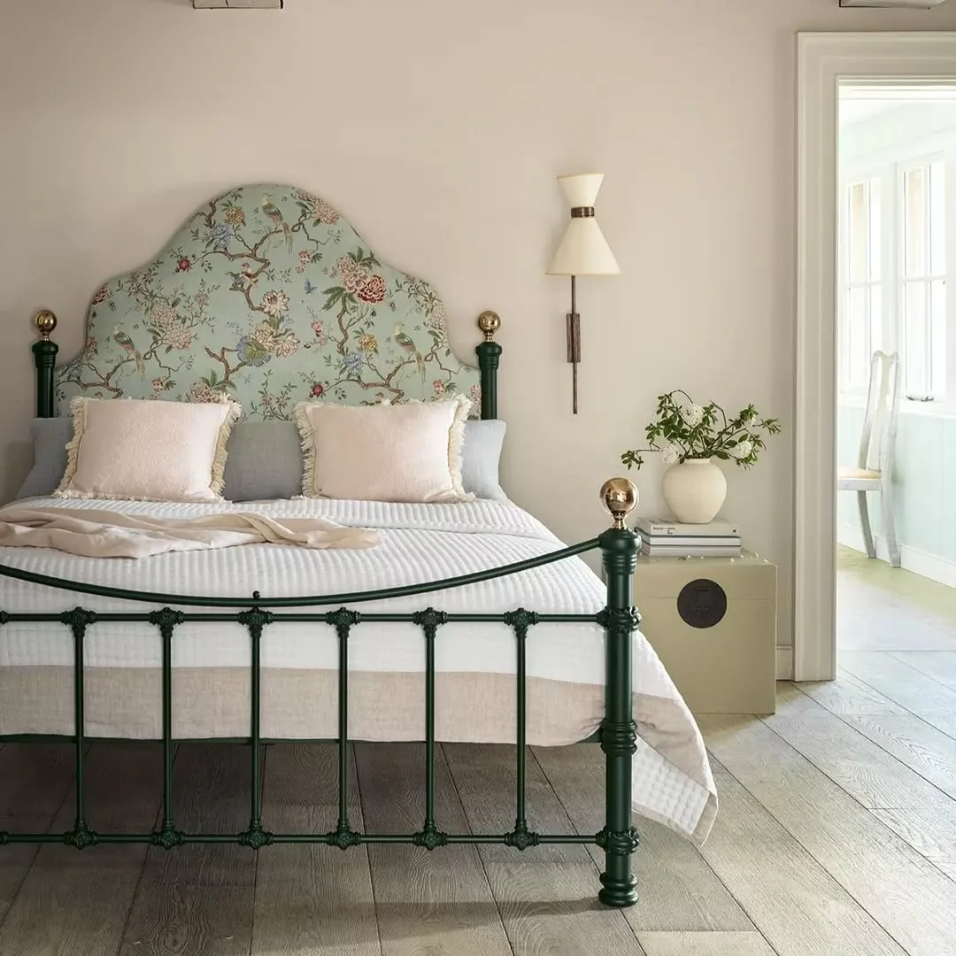 8. Vintage Garden with Green Iron Detail (Metal Bed Frame Bedroom Ideas)