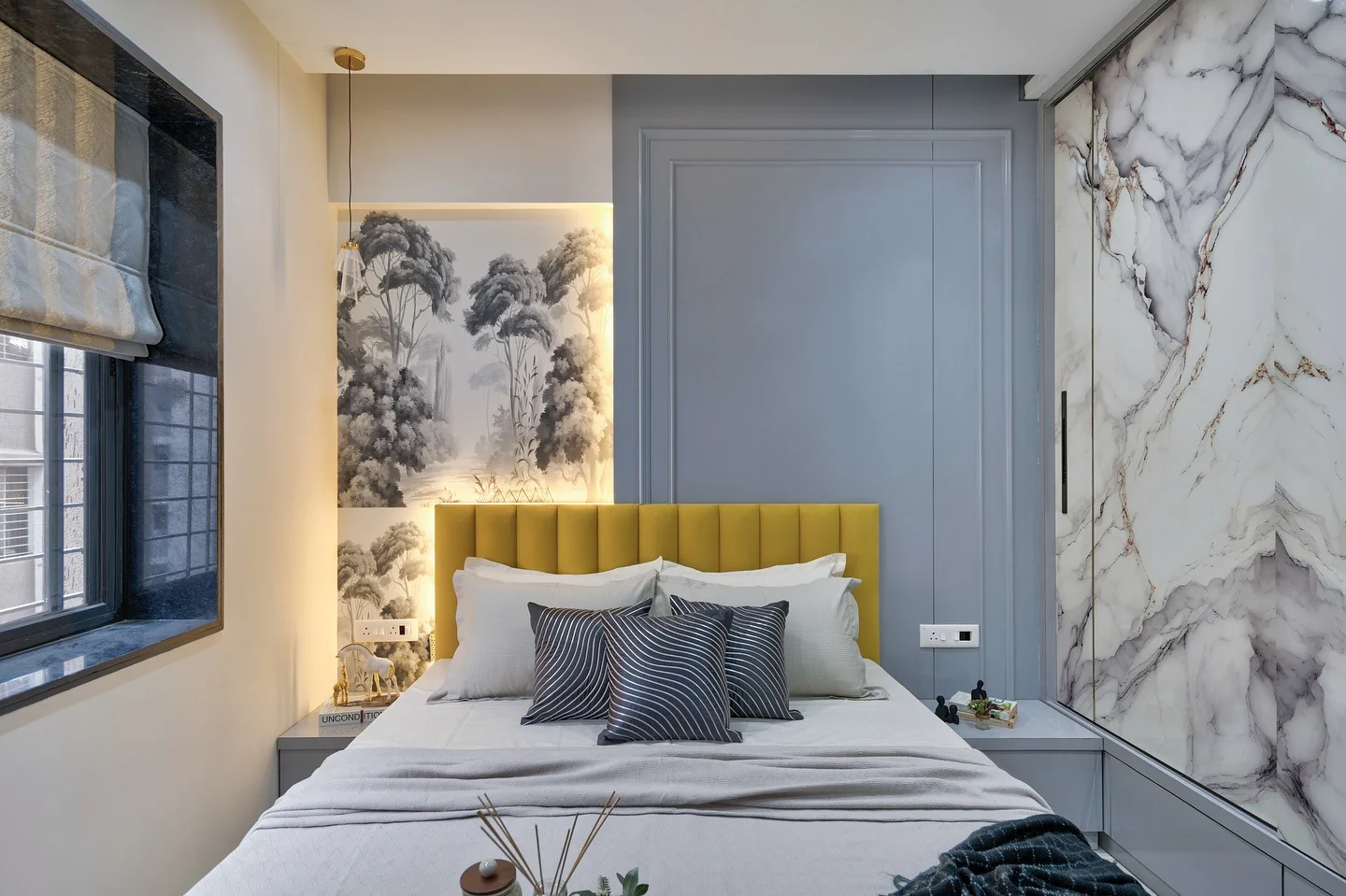 7. Art-Inspired Contrast with Graphic Wallpaper (Gray Wall Bedroom Ideas)